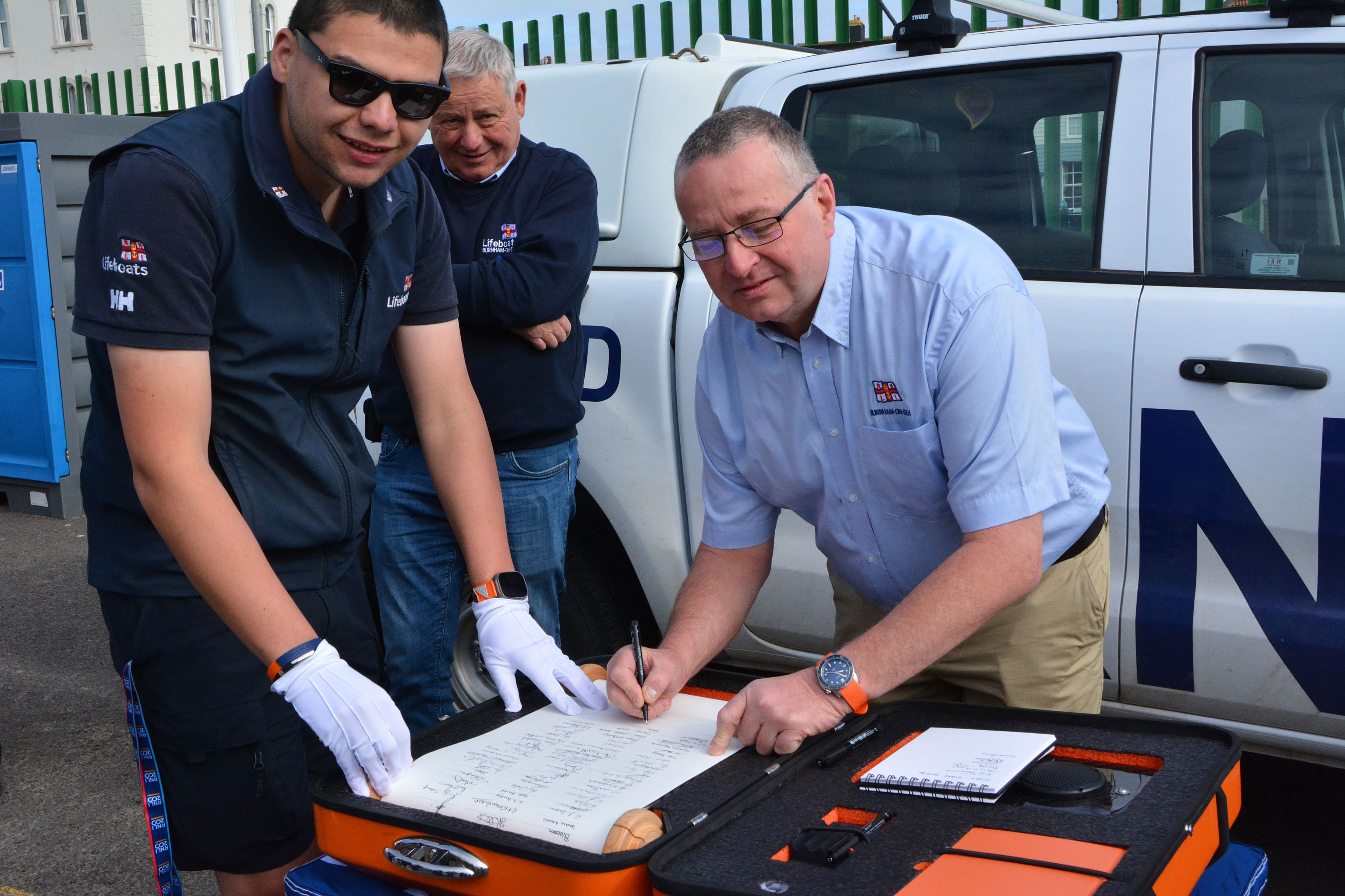 Launch Authority/Helmsman Scot Rundle was first to sign