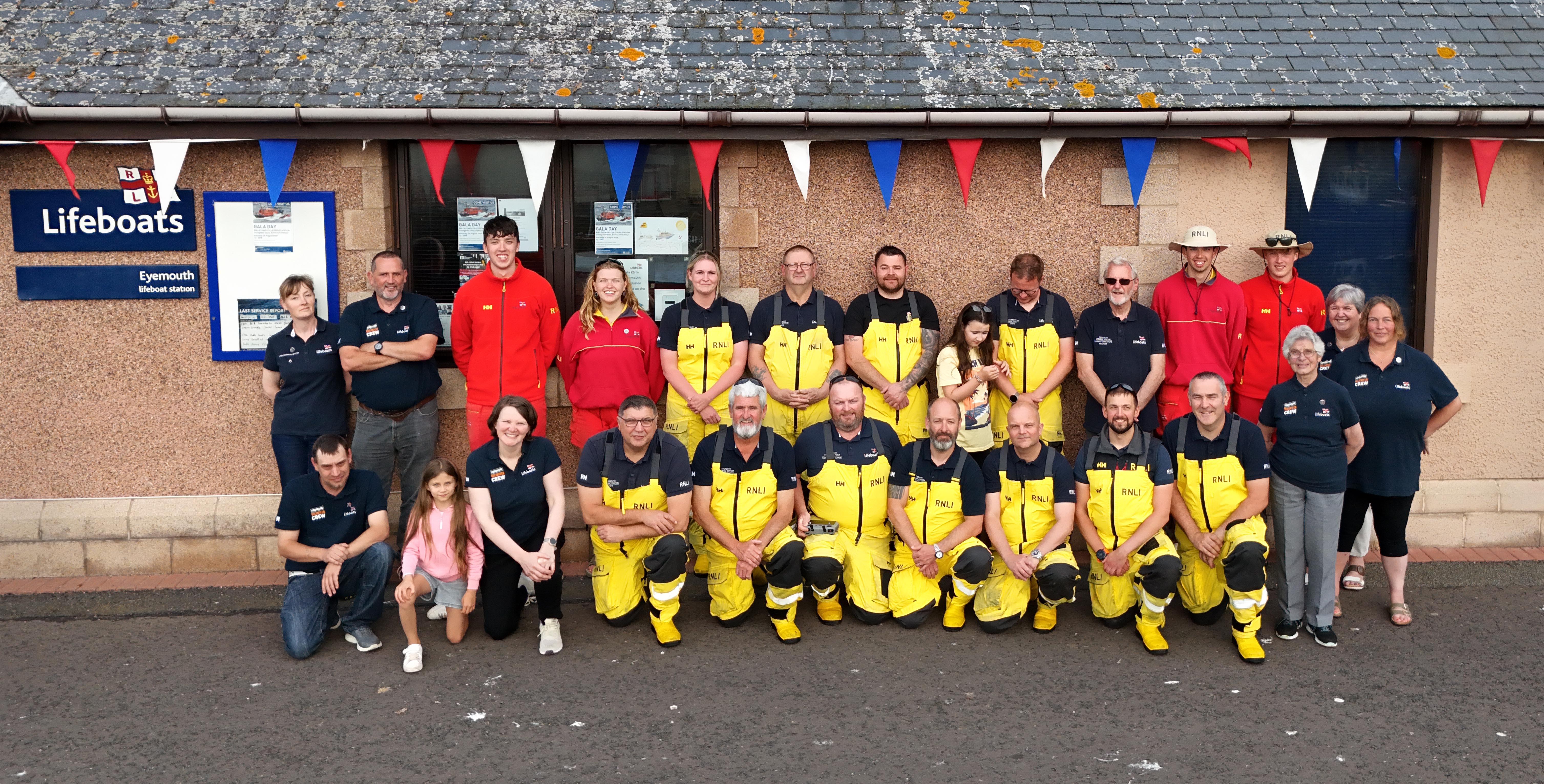 'One Moment One Crew' at Eyemouth RNLI, volunteers come together at Eyemouth lifeboat station for a group photo