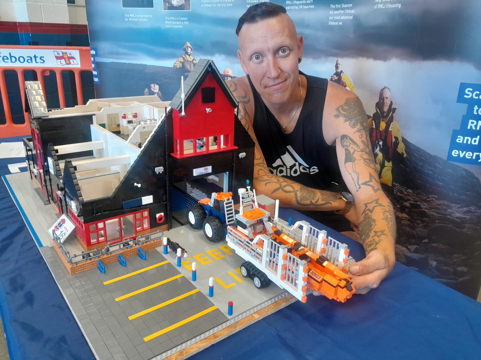 Matt Judge and his Leggo model of the Whitstable RNLI boathouse at the model lifeboat show to mark RNLI 200 at Whitstable RNLI on Sunday.