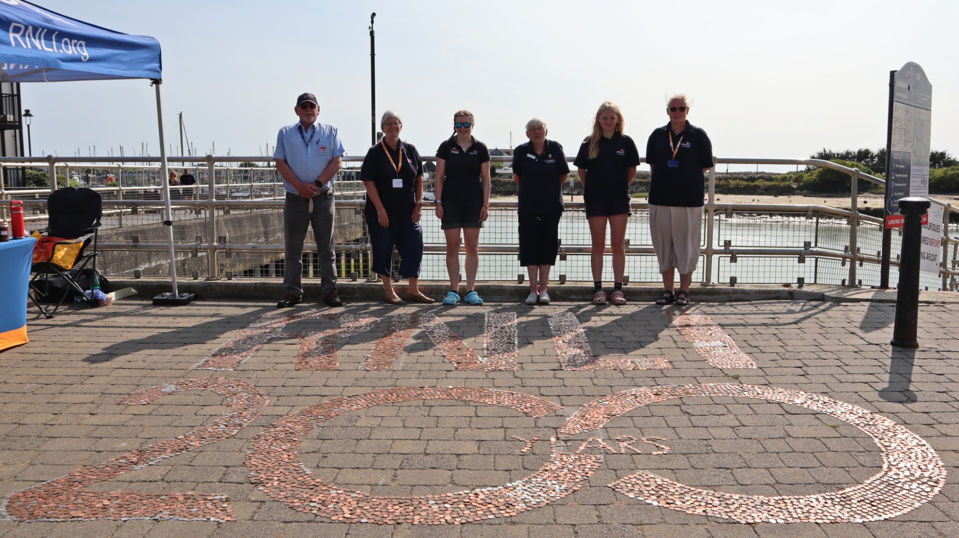 The Littlehampton RNLI fundraising team and the completed RNLI 200 coin challenge