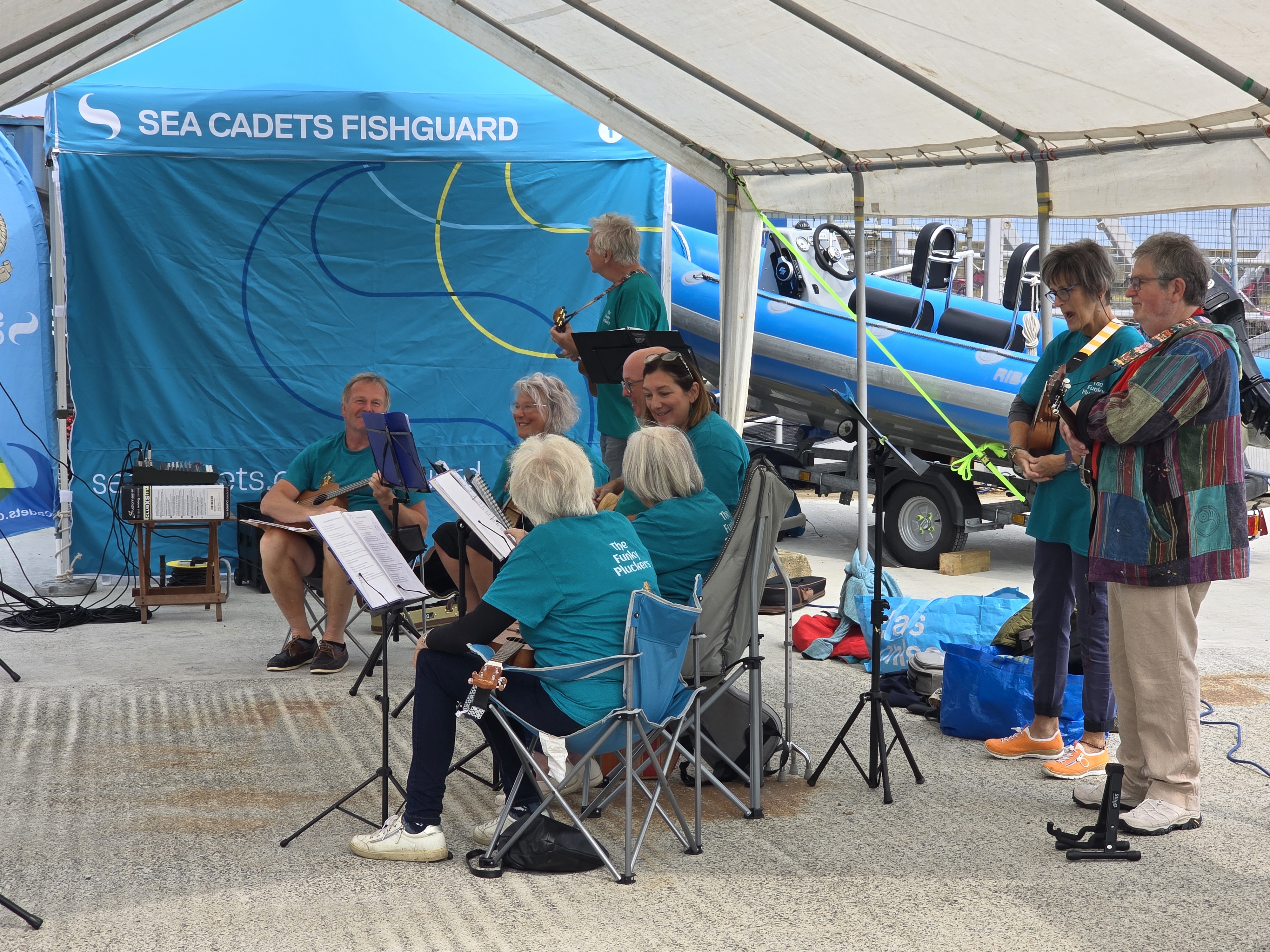 Local ukulele group The Funky Pluckers entertaining the crowds.