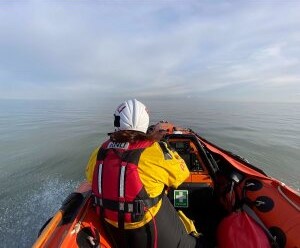 The inshore lifeboat in totally calm seas.