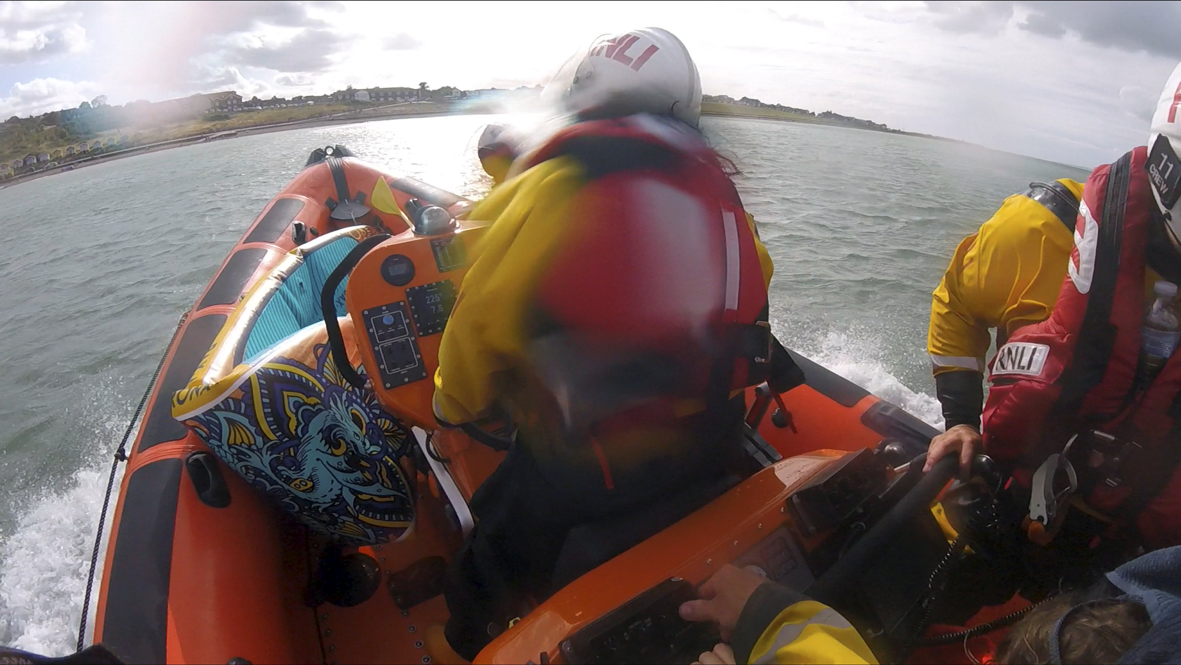 The Whitstable lifeboat heads for Minster beach to land a paddleboard and its two occupants ashore on Sunday afternoon.
