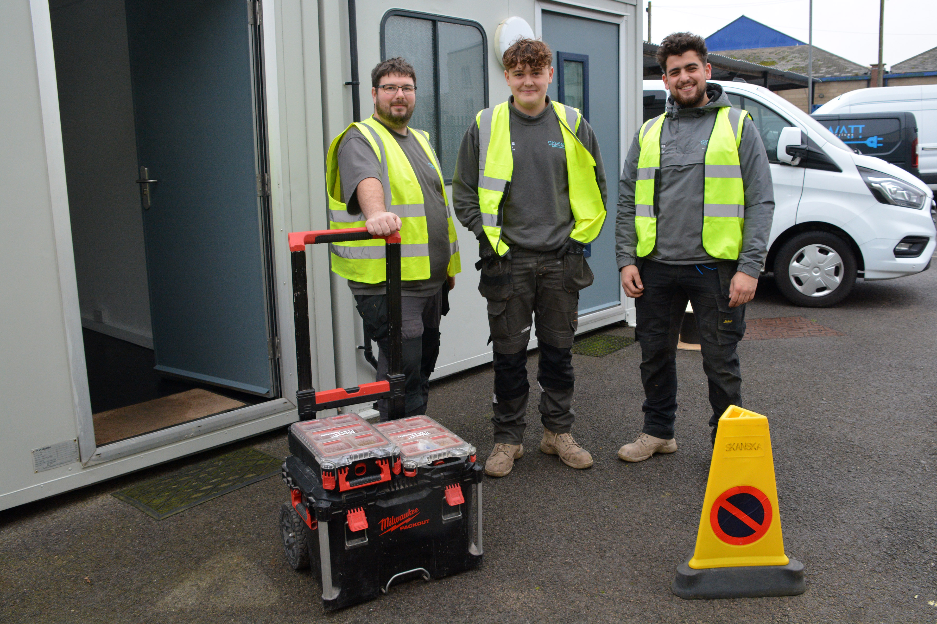 Gigawatt Electrical Services electricians Adam Bradbury-Smith, Reece Hall and Grayson Bennett. outside the two portable buildings