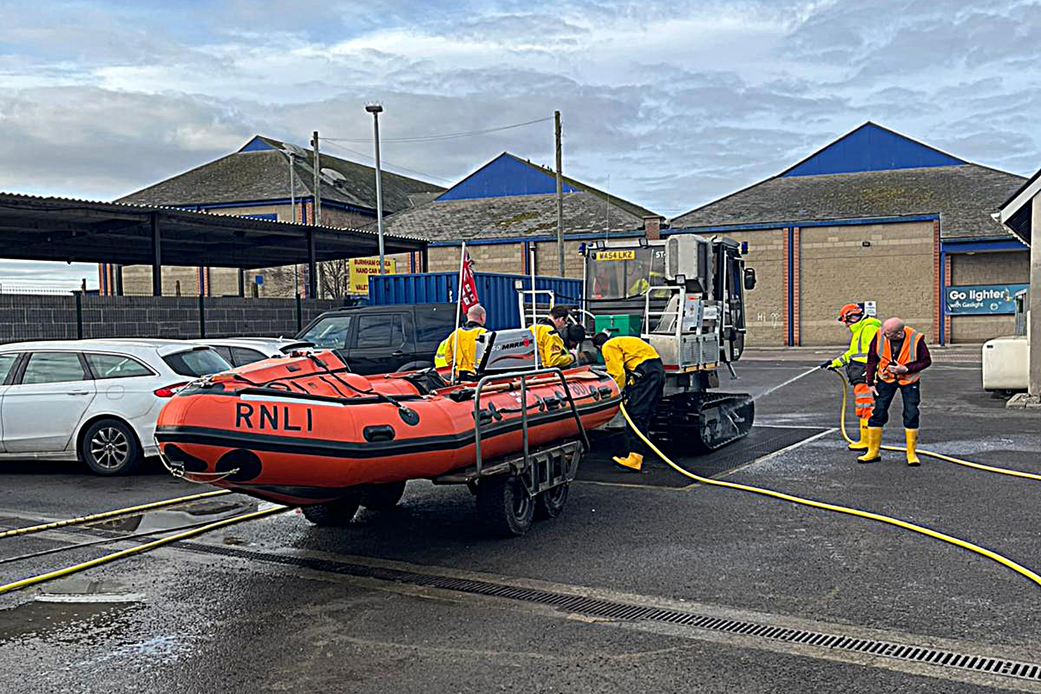Burnham's D class lifeboat Burnham Reach being washed down after recovery