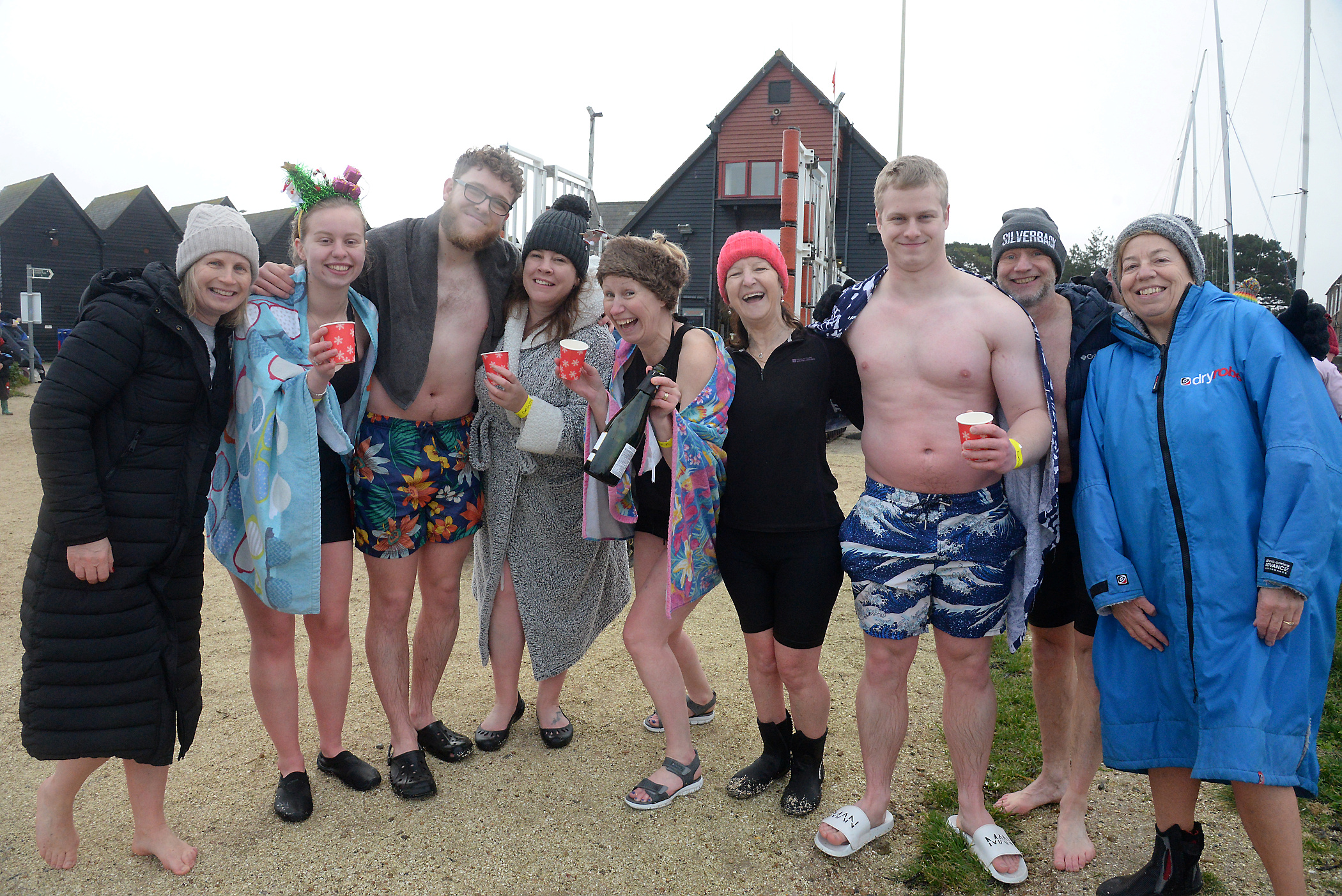 Lisa Faulkner, family and friends warm up after taking part in the Boxing Day dip at Whitstable RNLI.
