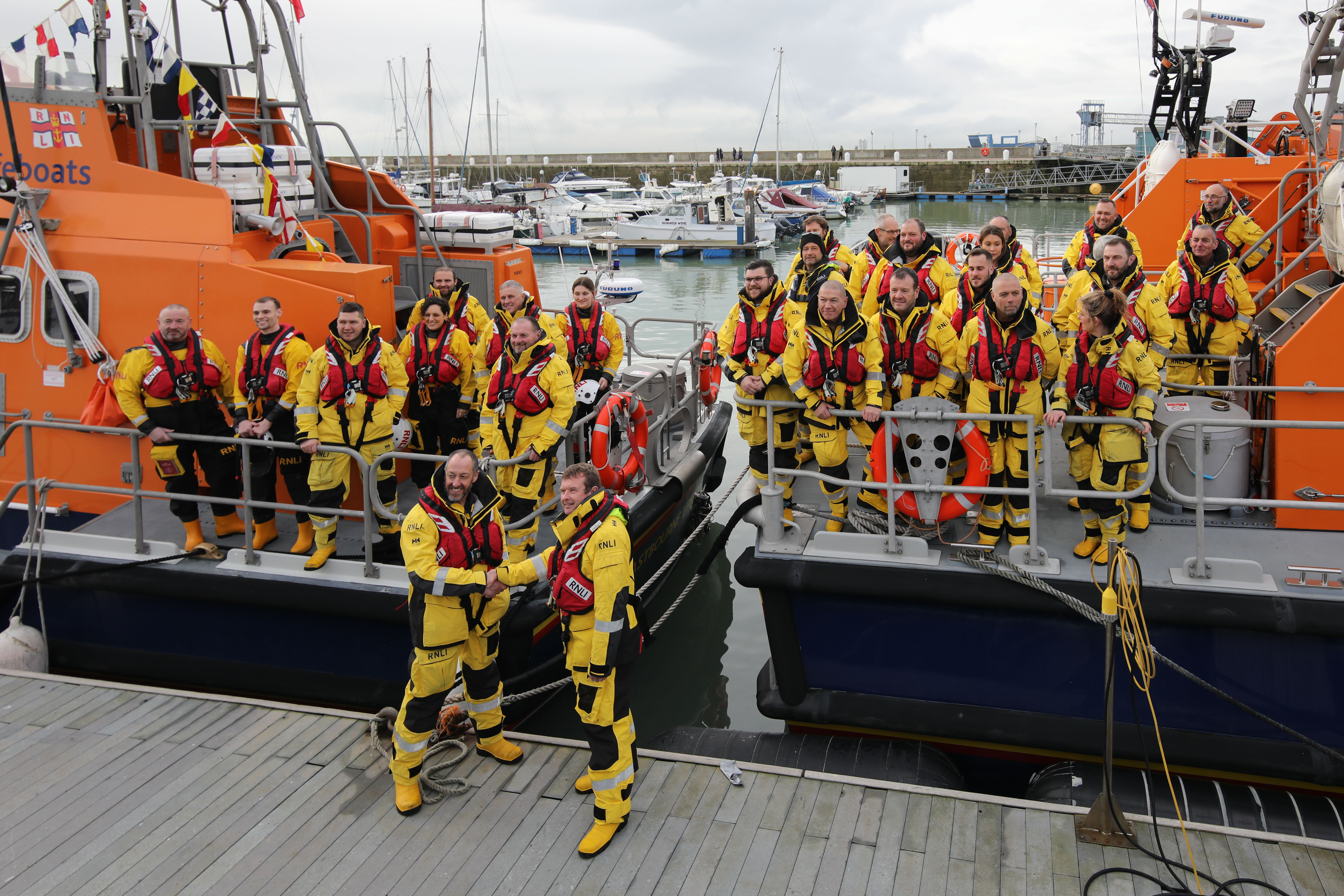 A gathering of crew on the lifeboats