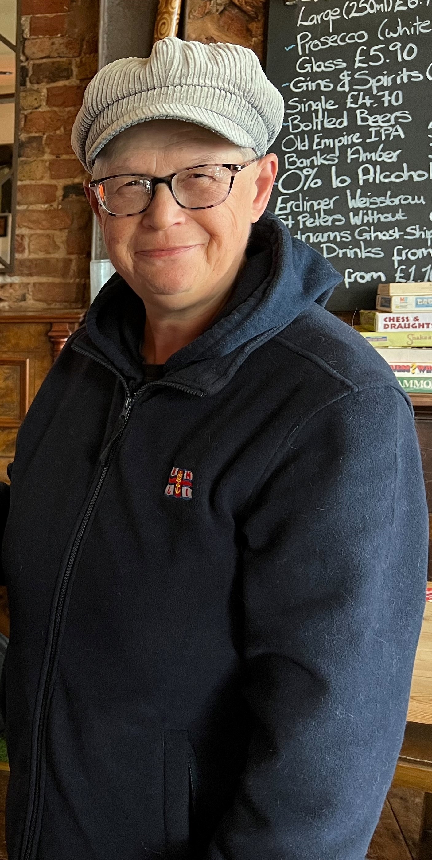 a lady in RNLI top smiling at the camera