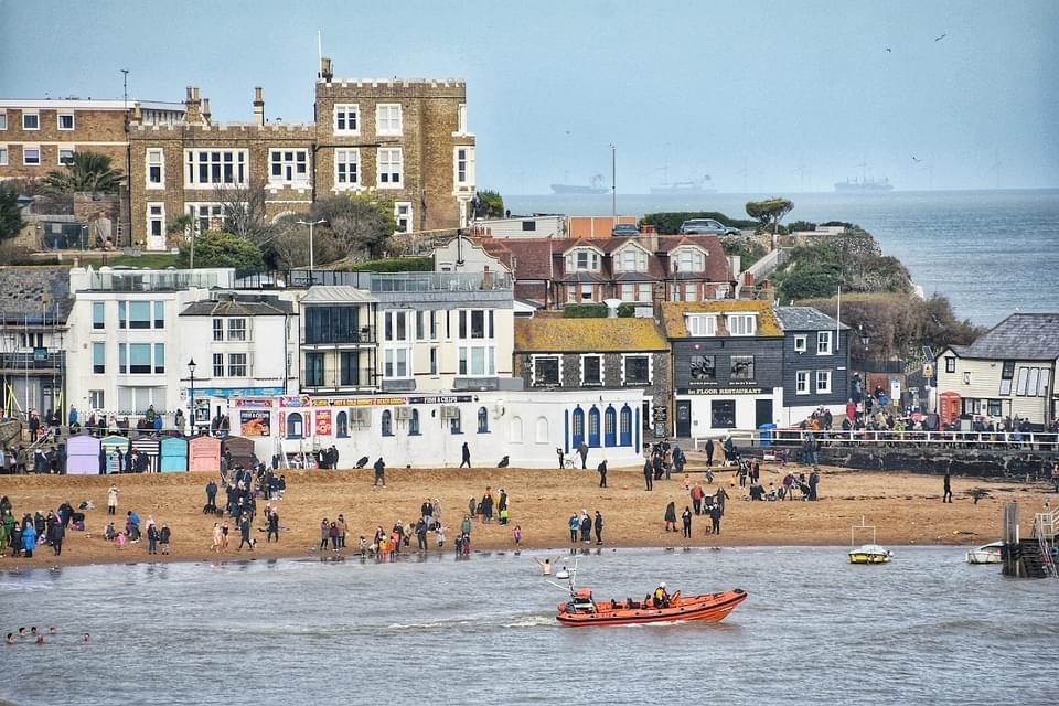 an inshore lifeboat approaching the harbour. 
