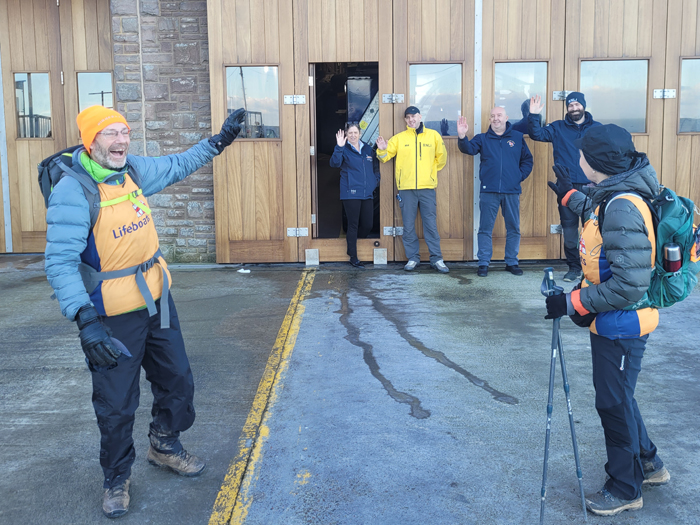 Seahouses Crew waving farewell to Charity Walkers Anthony and Sally Brown