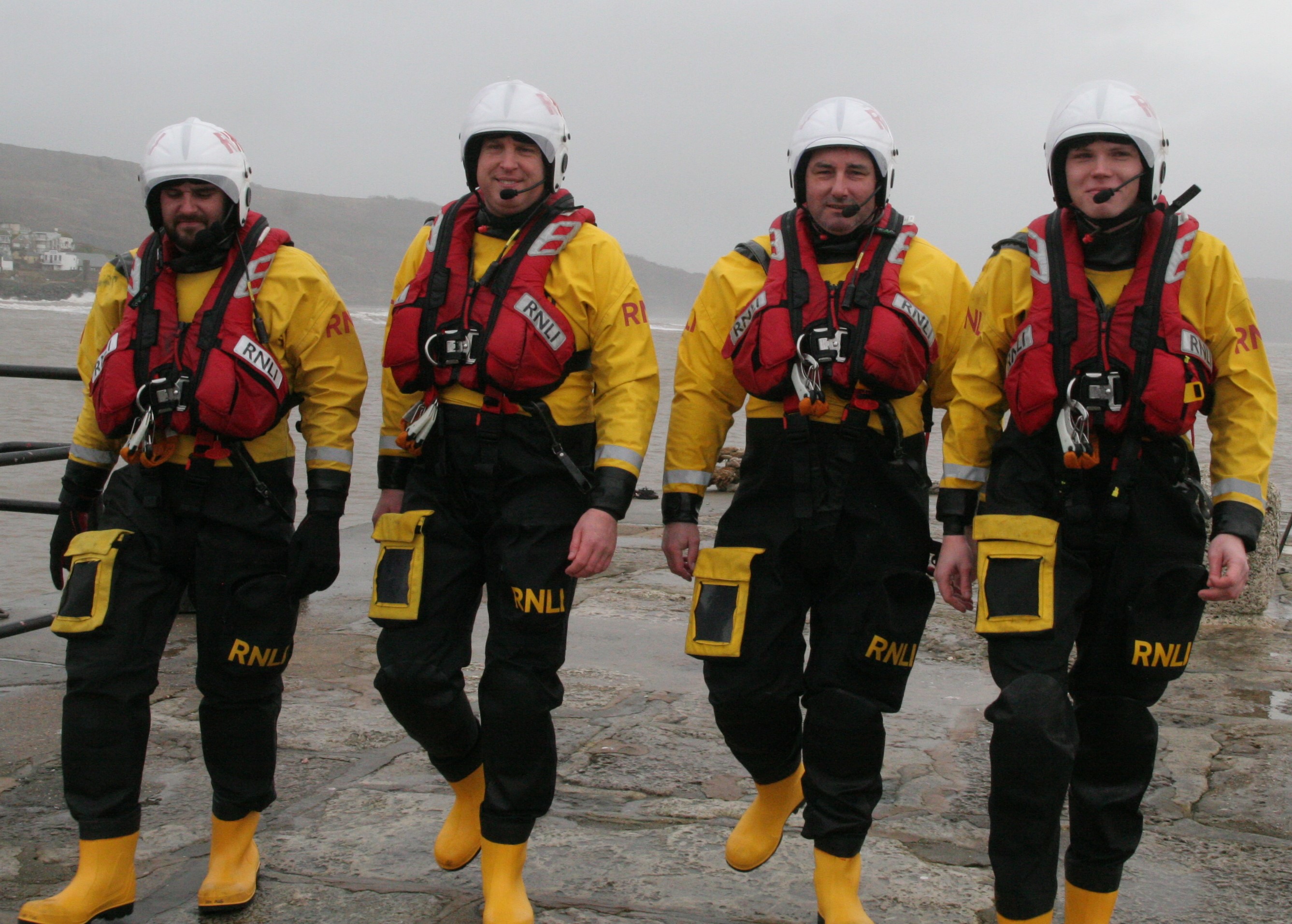 Four members of the Lyme Regis RNLI crew prepare for the February 11th walk.