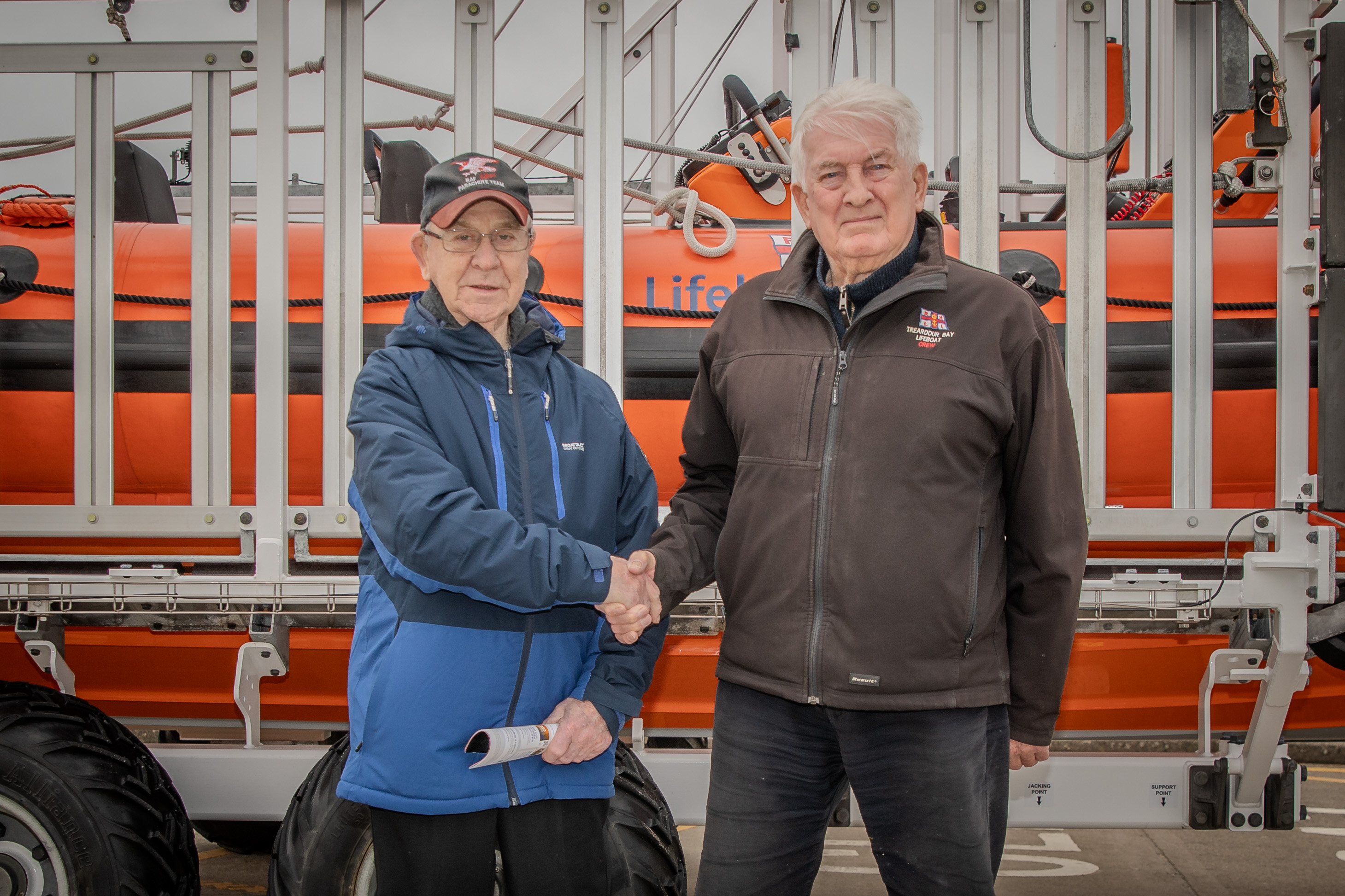 Ray and Jack shaking hands