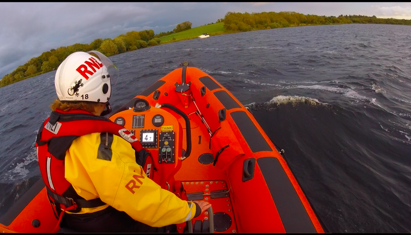 Looking over the shoulder of the helm, the casualty vessel can be seen in the distance