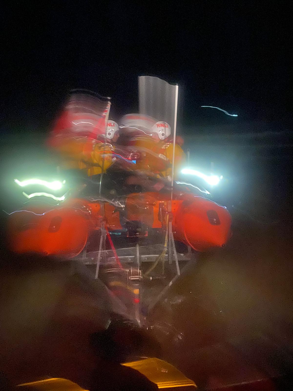 Port Talbot RNLI recovering after their tasking, reflections in the darkness