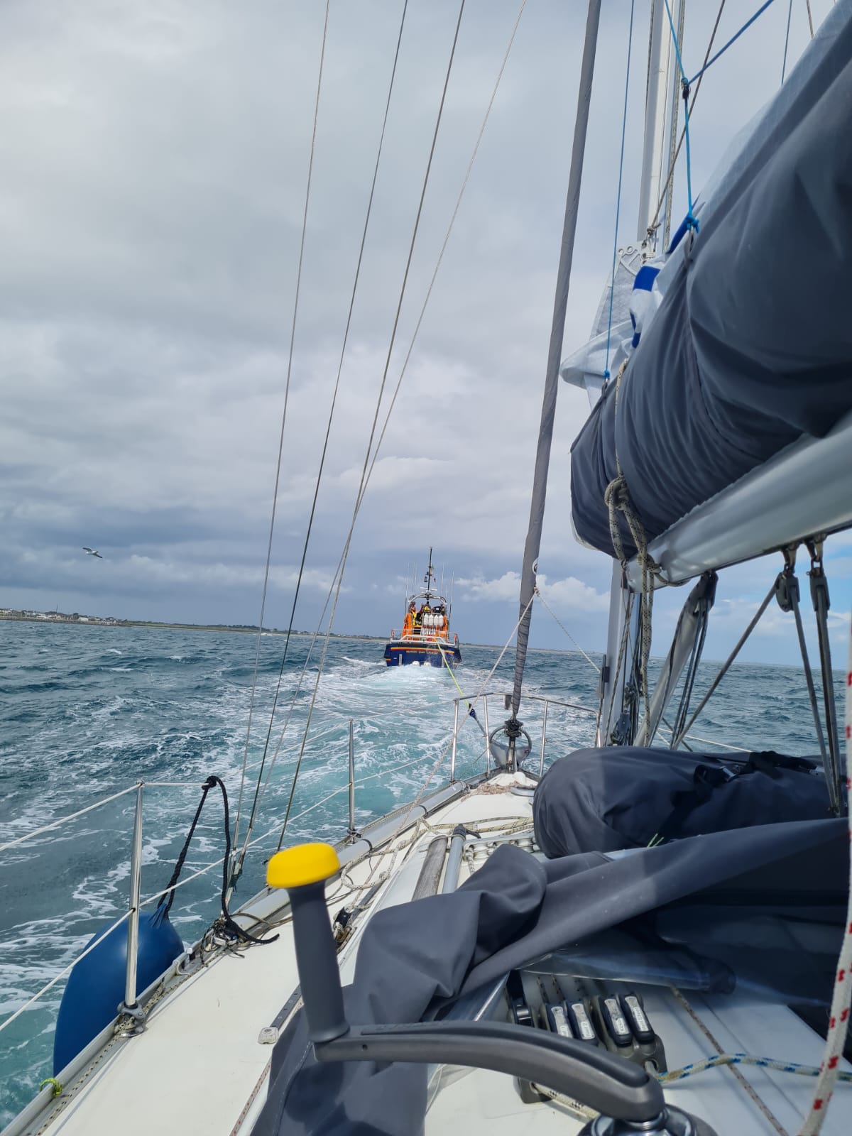 View of lifeboat from casualty vessel under tow