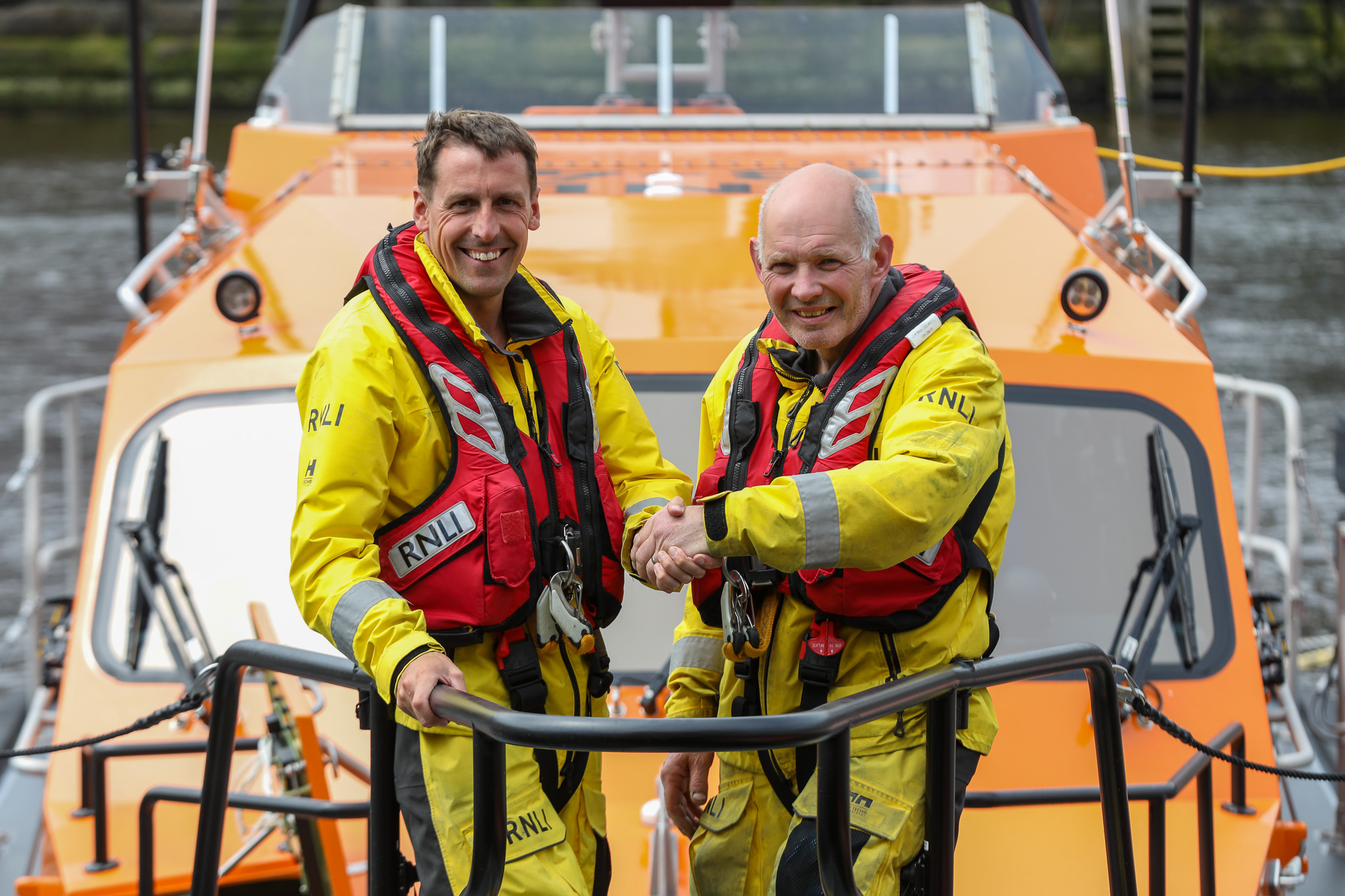 Whitby RNLI Station Mechanic Richard Dowson with volunteer Keith Attridge on the Shannon class lifeboat.