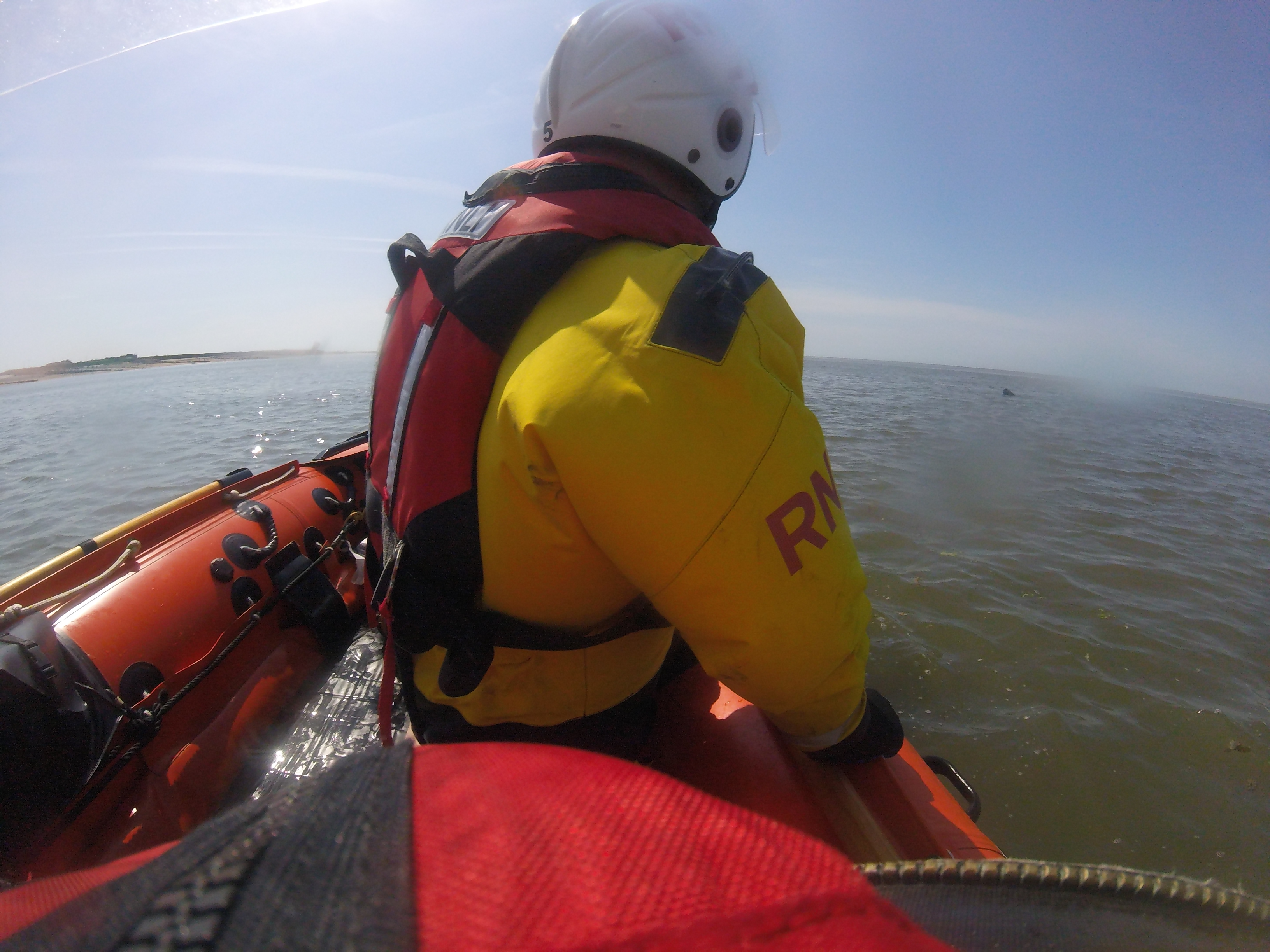 One of the party in the water, just after being spotted by the crew.