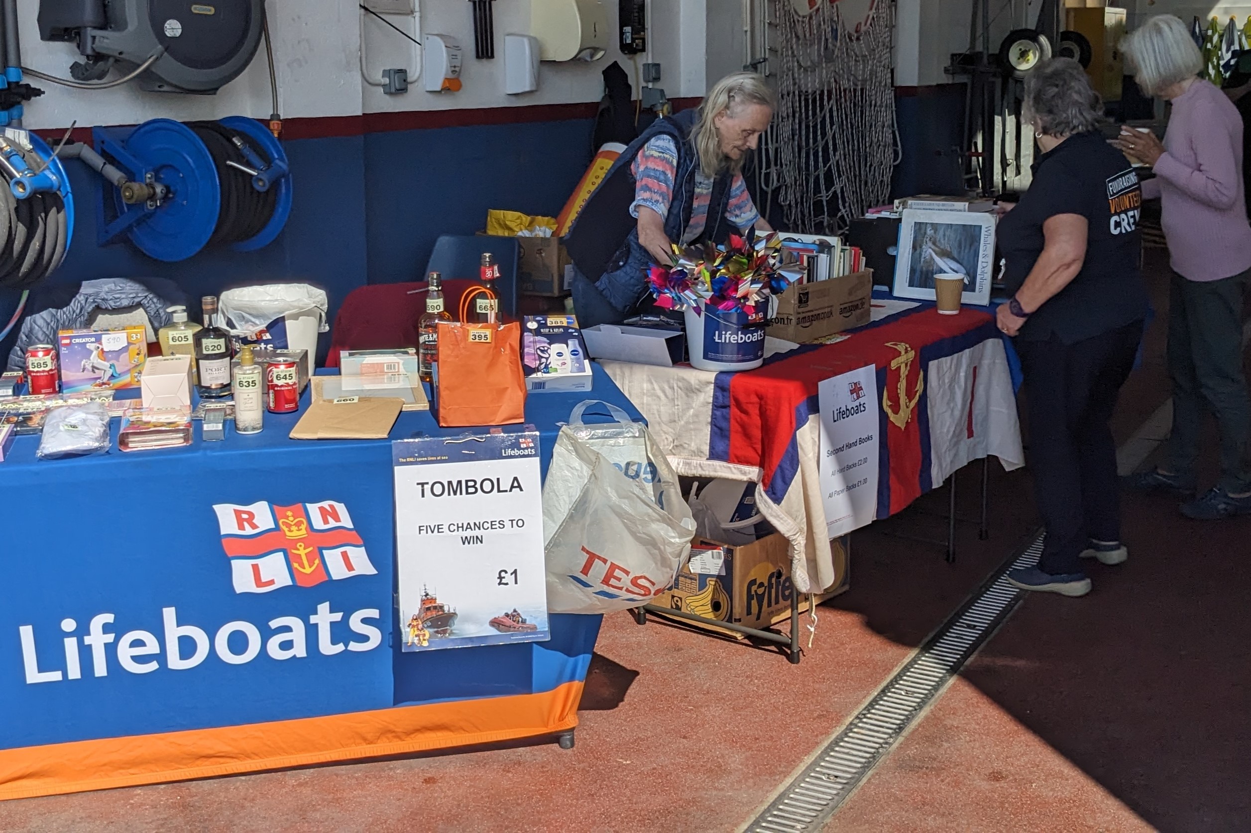 The ladies from the fundraising guild setting up their stall just inside the lifeboat station