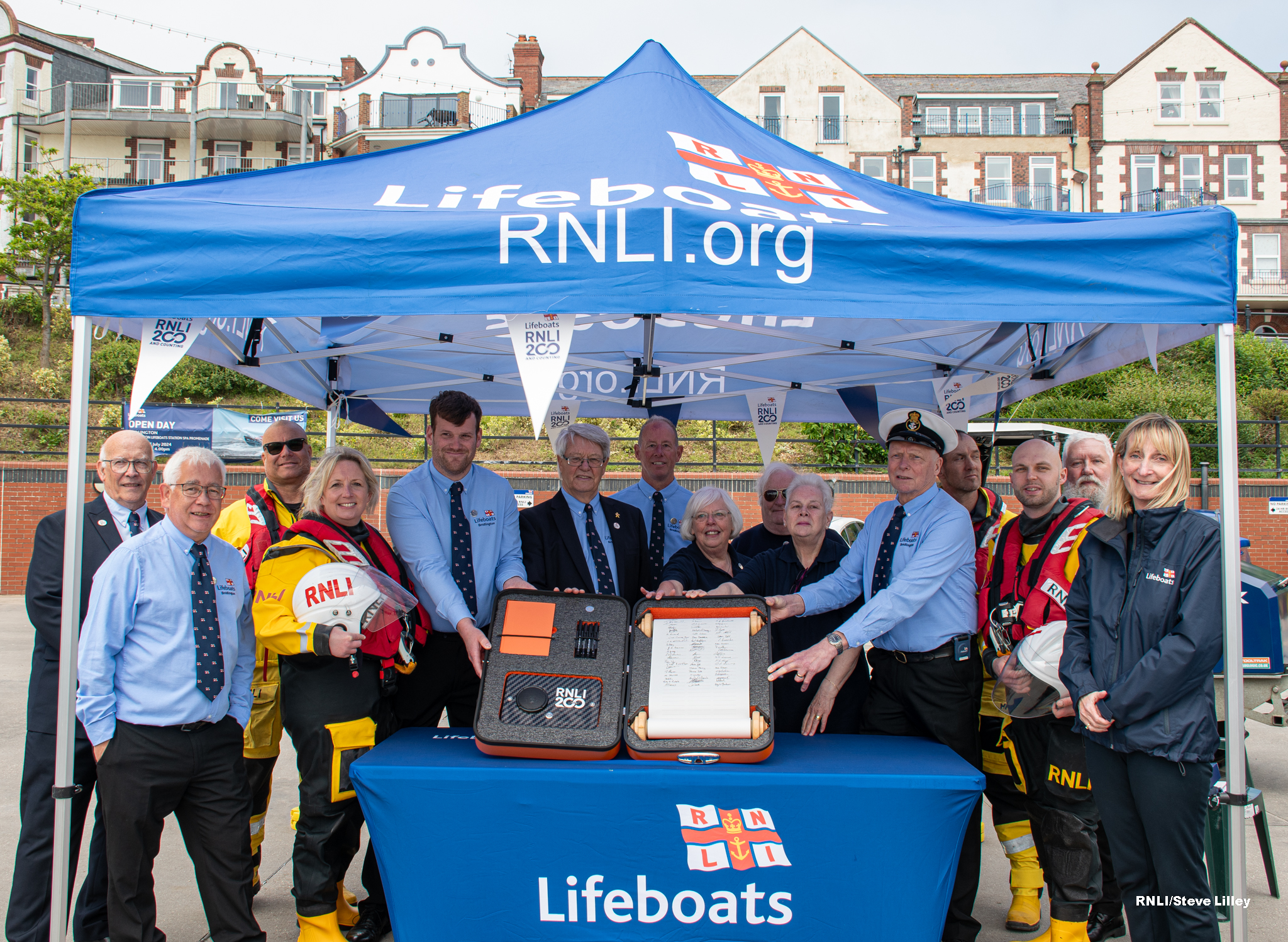 Bridlington RNLI volunteers with the RNLI ‘Connecting our Communities’ scroll.