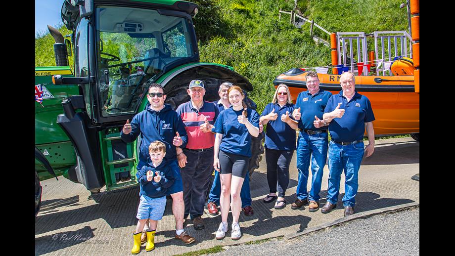 RNLI200 Scroll delivered to Flamborough Lifeboat Station Four year old Henry Binsley with signatories and escorting drivers. Leading tractor and Lifeboat behind.