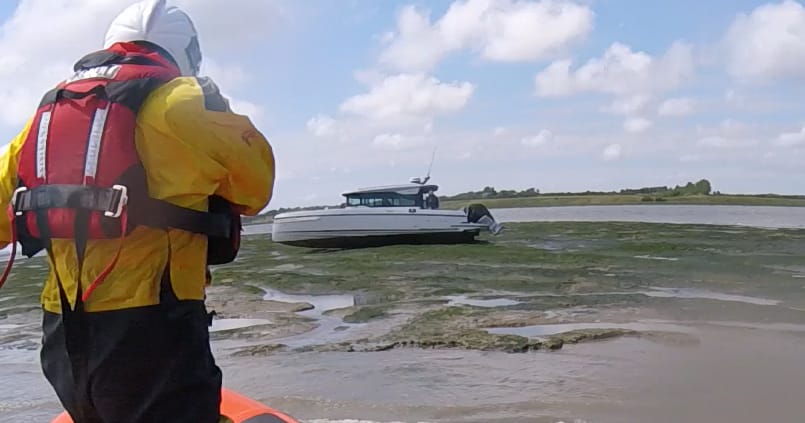 The motor cruiser aground on the Horse Sand in The Swale on Thursday. 