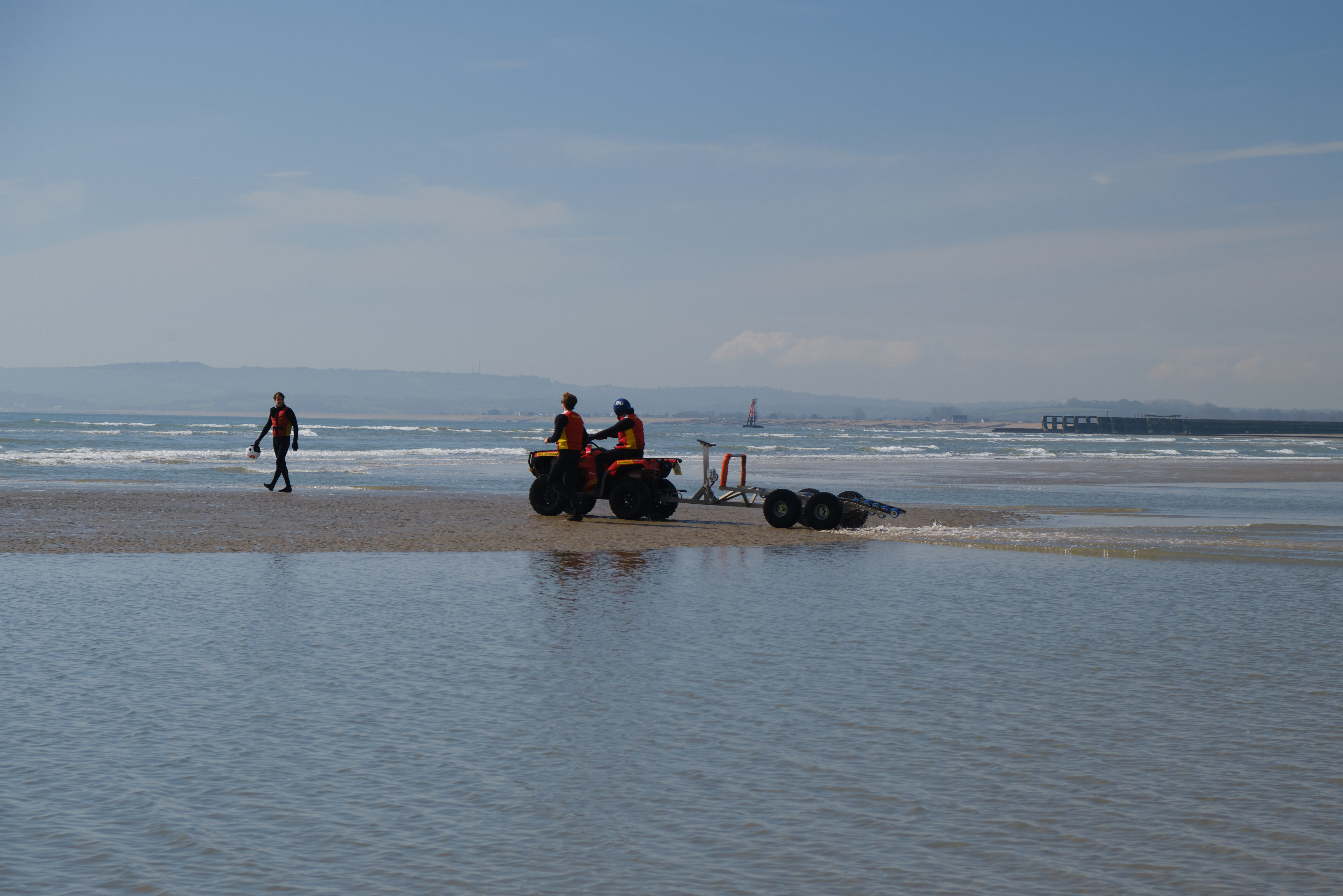 RNLI lifeguards on Camber Sands with their 4WD