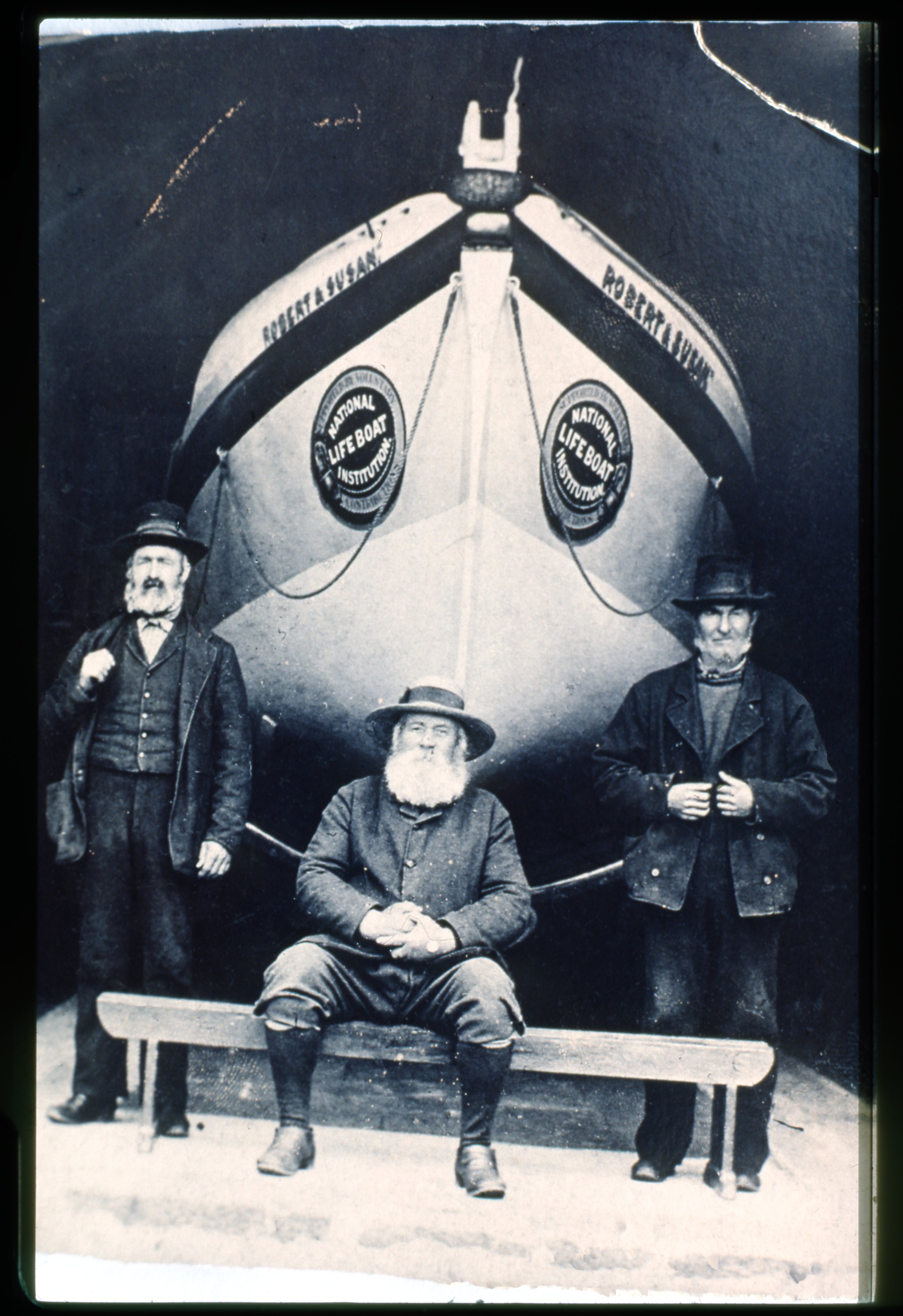 Philip Jefferson centre in front of the Robert &amp; Susan lifeboat 1885