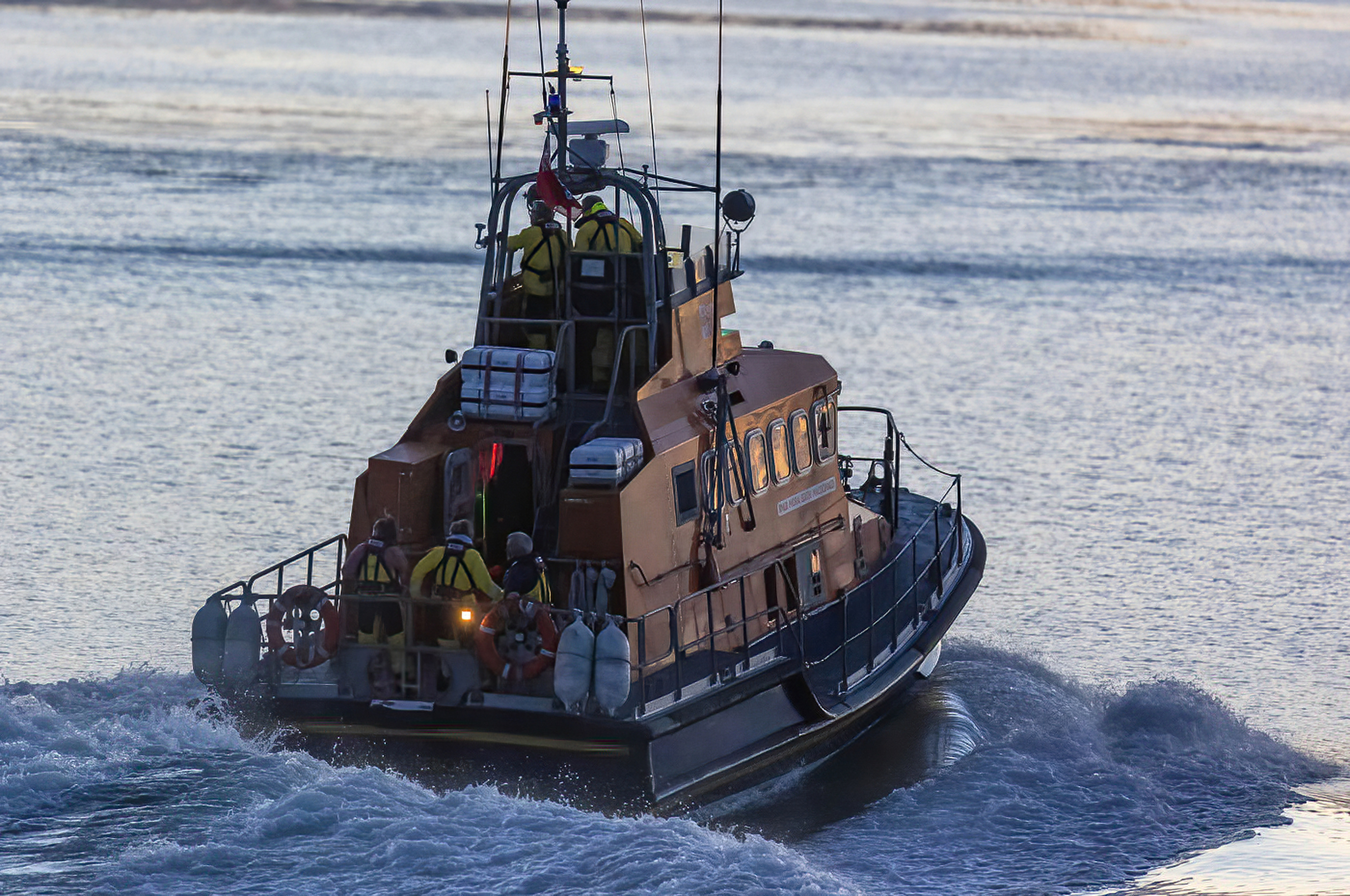 The Trent class Mora Edith MacDonald heading away from the camera in dwindling light
