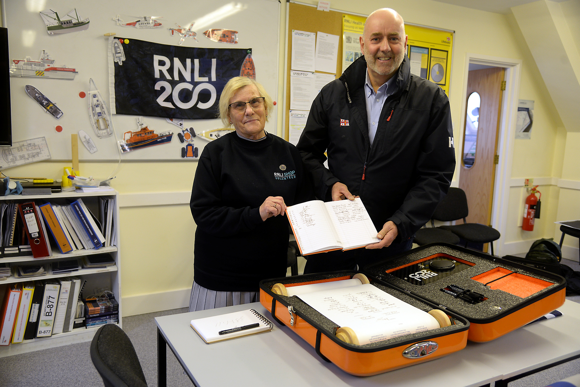 Julia Hill and Andy Mayo signed the 'Connecting our Communities scroll on behalf of Whitstable RNLI on Sunday afternoon.