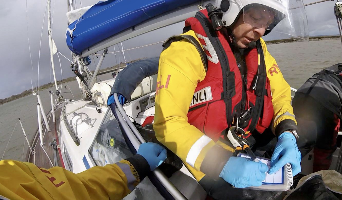 Lymington crewman assesses head injury patient