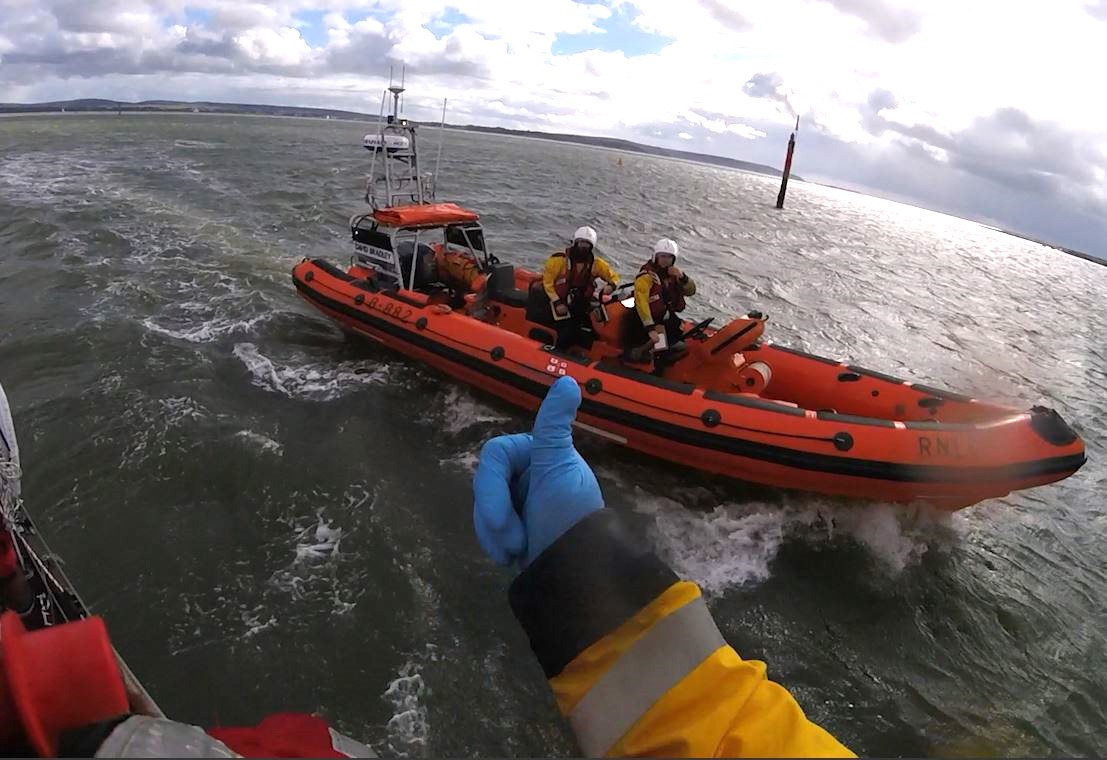 Lymington Lifeboat accompanying casualty vessel