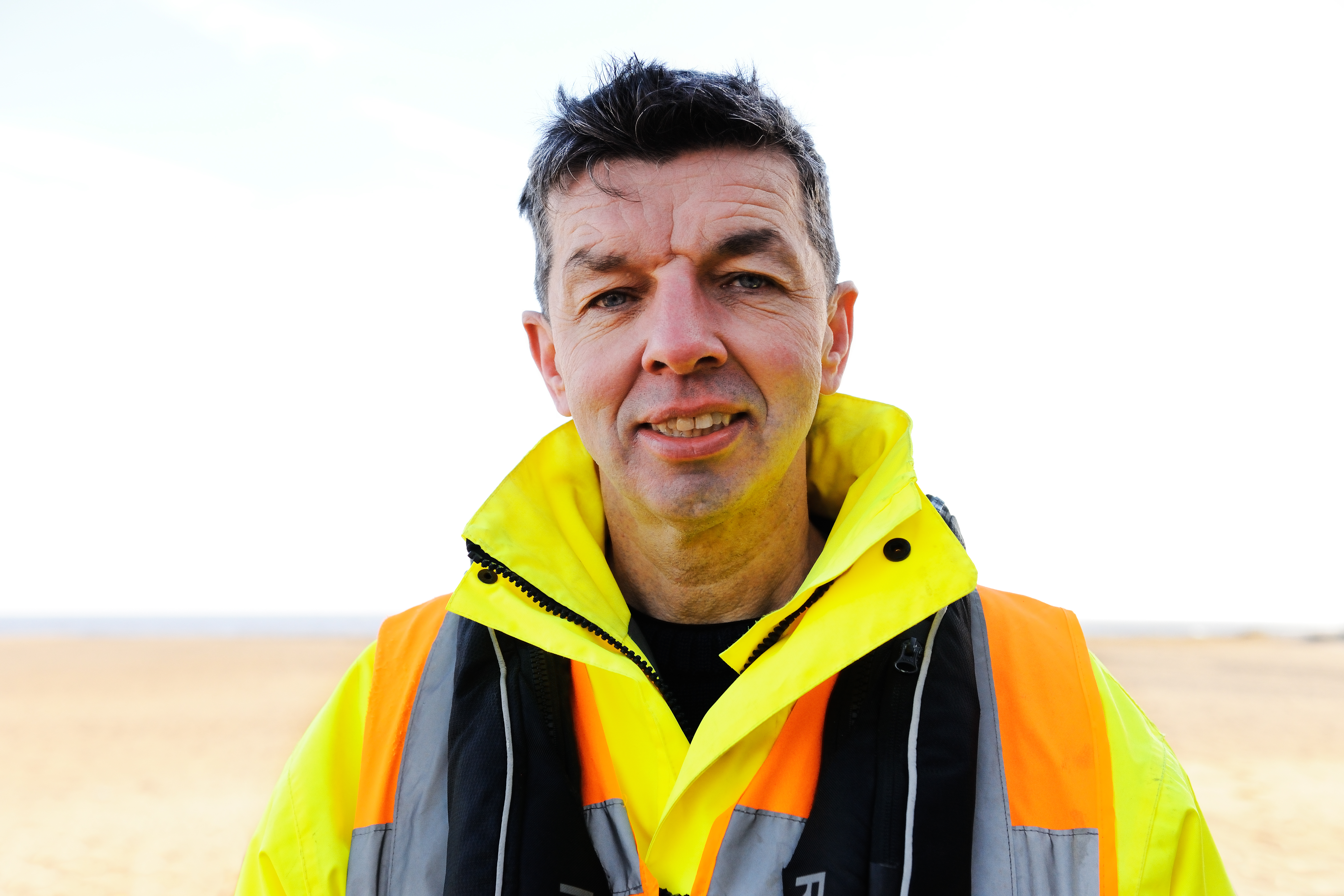 Portrait of man in yellow jacket