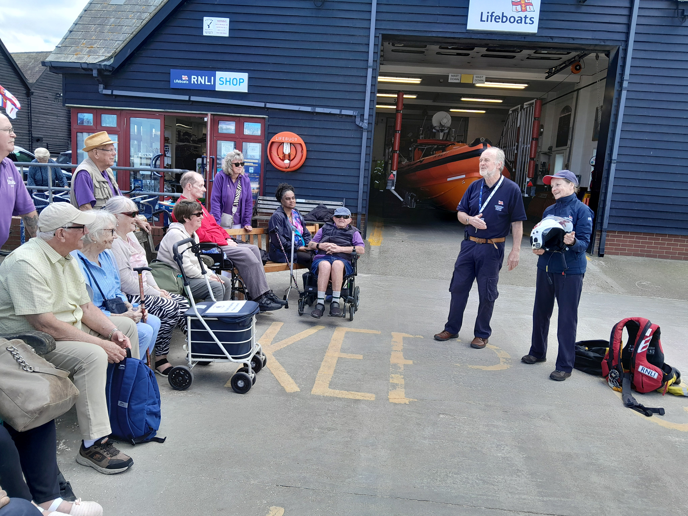 Whitstable RNLI's David Hayward and Sue Evans chat with members of the Swale Stroke Group at Whitstable RNLI on Friday.