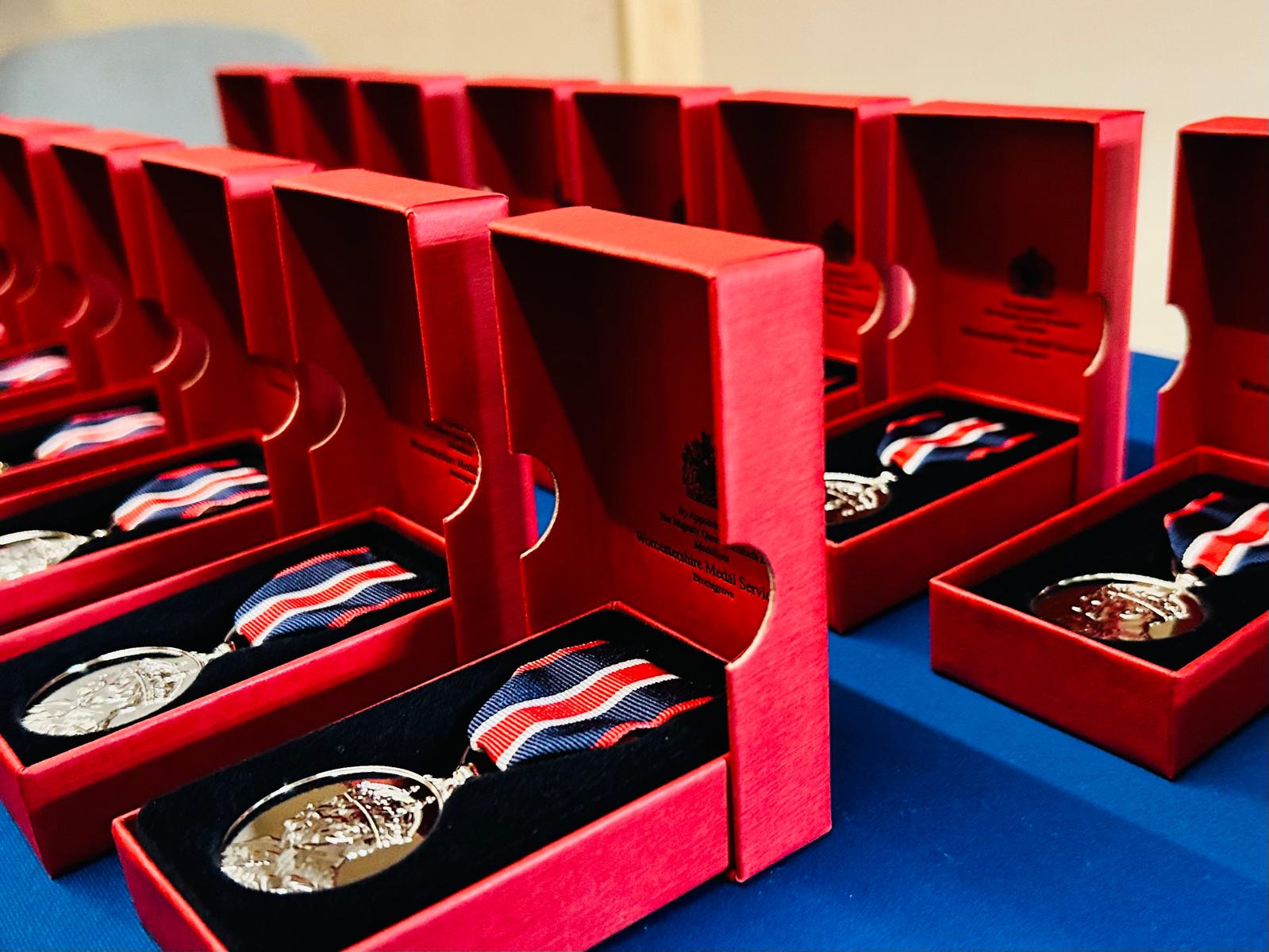 A row of King Charles III Coronation Medals