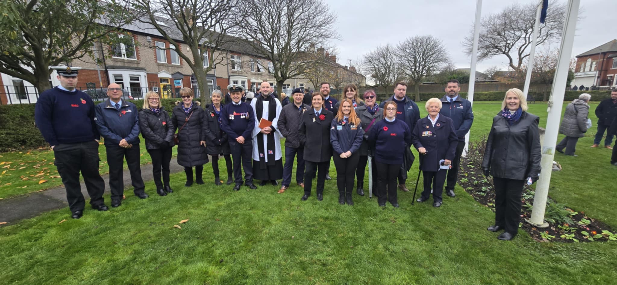 The volunteers together at the end of the service
