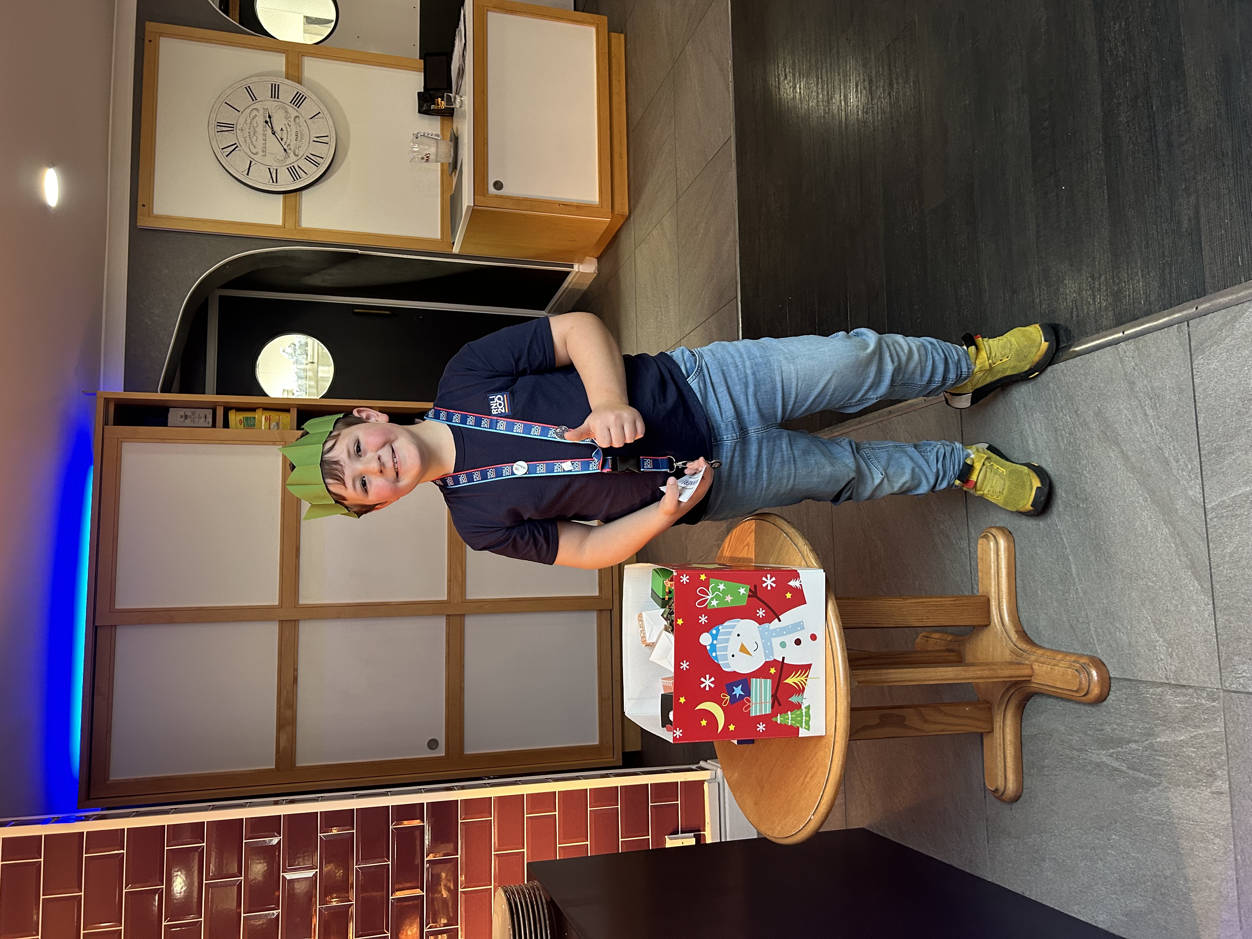 Daniel helping with the lucky dip draw at Christmas Lunch