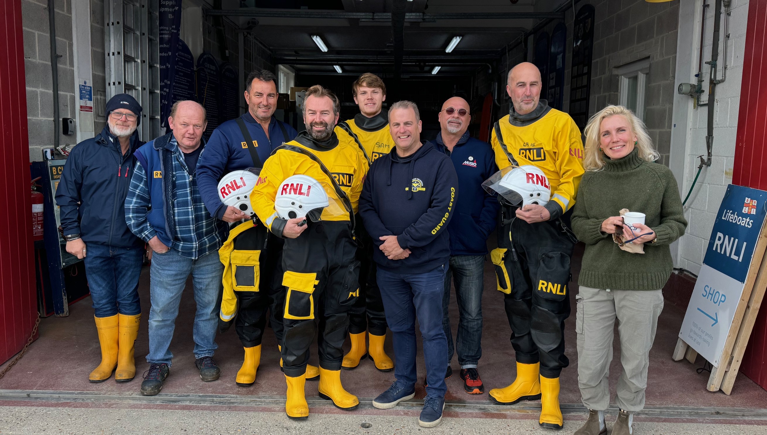Group photo of visitor with lifeboat crew
