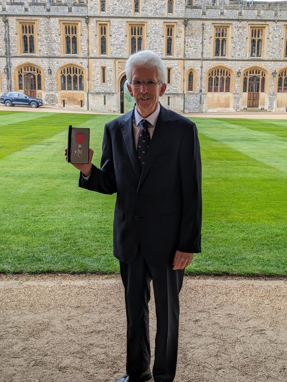 Mike in Windsor Castle for his MBE presentation