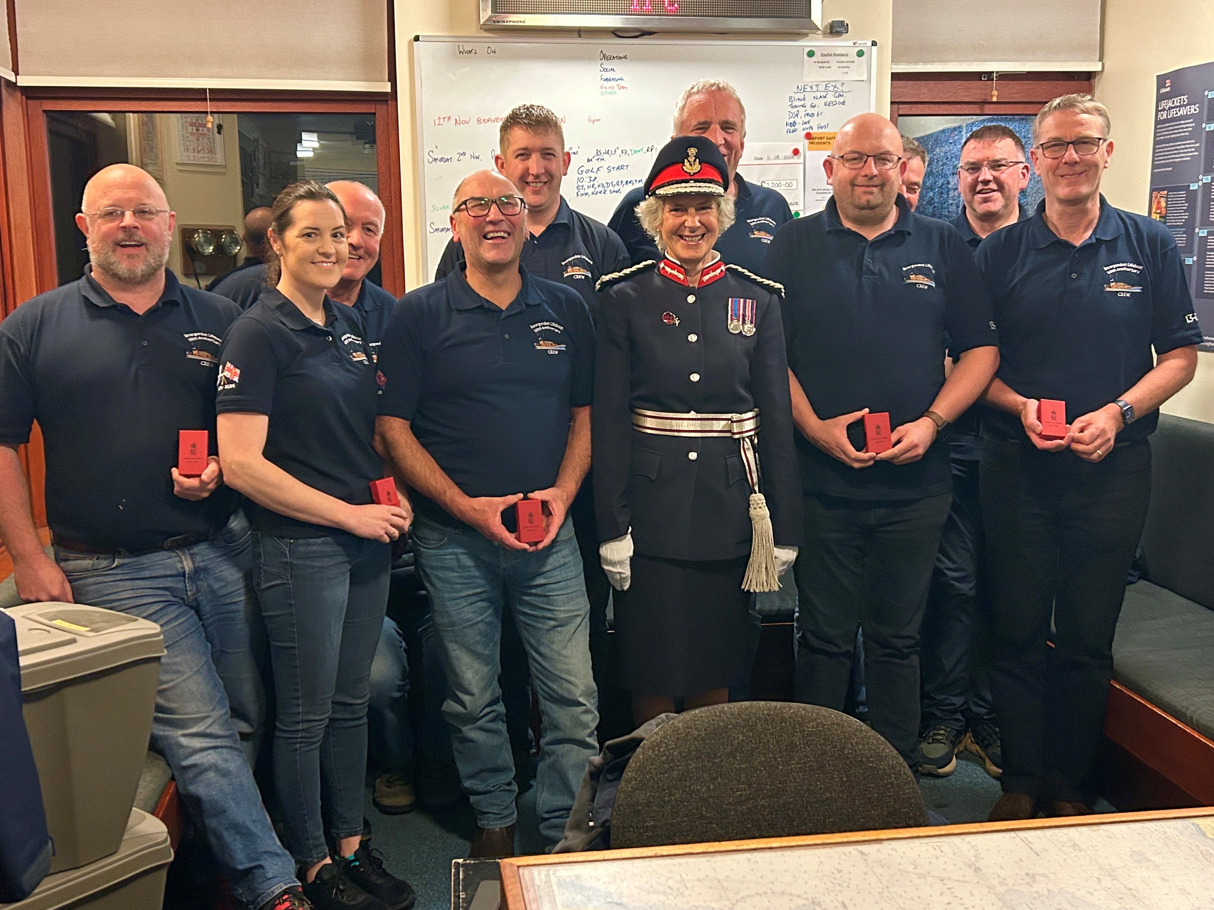 RNLI Volunteers with His Majesty’s Lord-Lieutenant, Mrs Joanie Whiteford and their medals