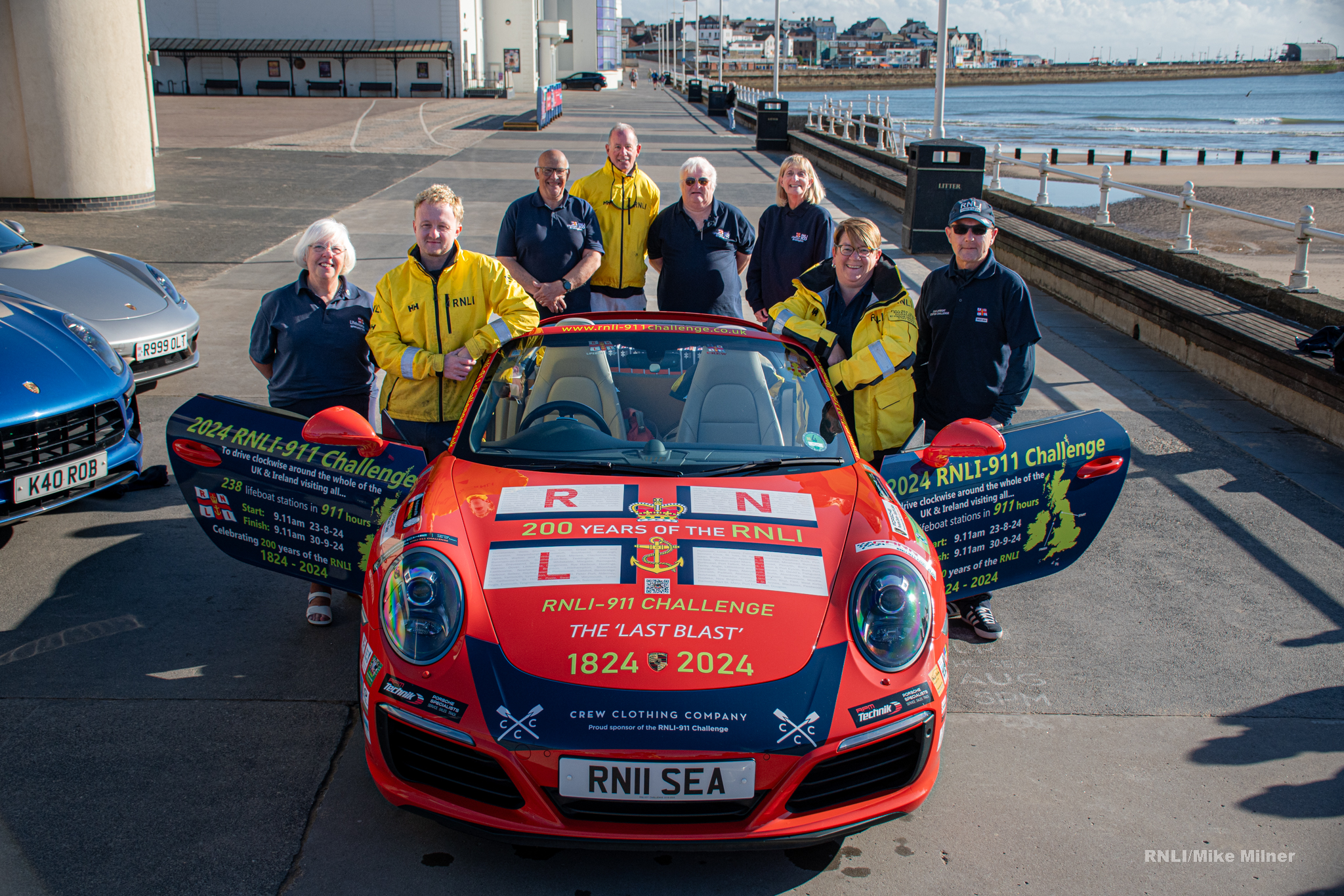 Bridlington RNLI volunteers and 'Splash' the Porsche 911.