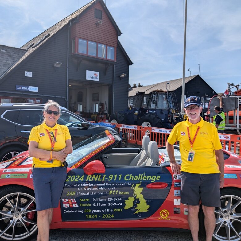 Belinda and James Richardson with their Porche911 at Whitstable RNLI on Sunday. Picture:Sam Turner/RNLI Whitstable.