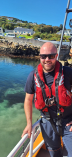 Sean Curtin, RNLI Resilience Coxswain onboard the lifeboat