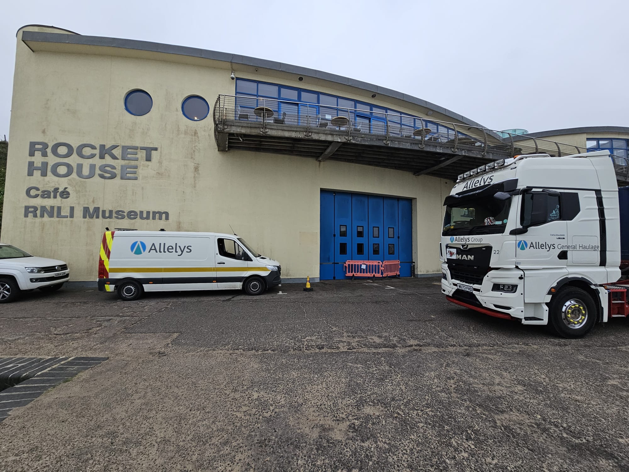 Specialist movers arrive at the RNLI Henry Blogg Museum in Cromer - pictures show work vehicles from the specialist removals firm parked outside the RNLI museum at the Rocket House
