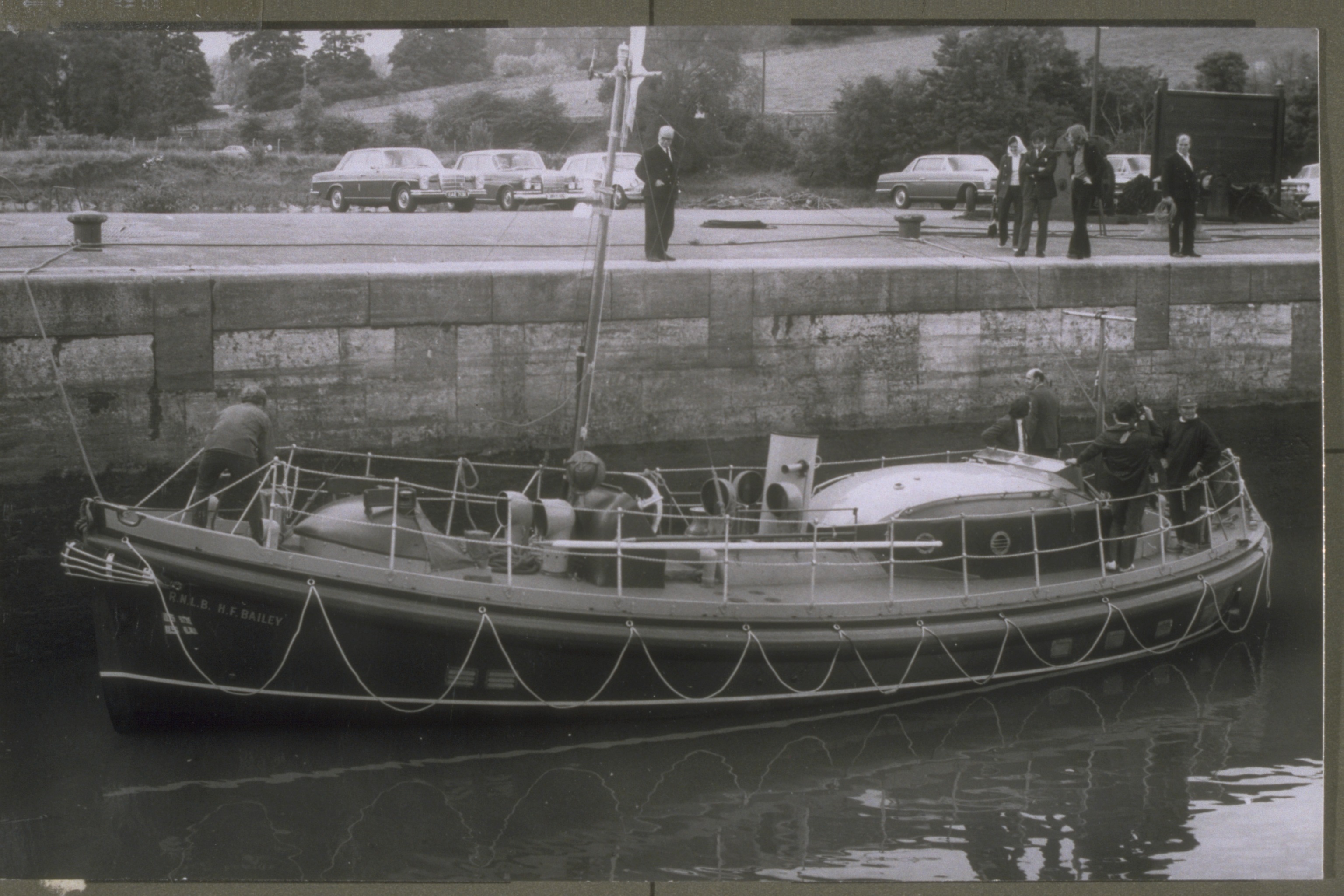 Cromer station. ON 777.Watson Motor class. 'H F Bailey' Lifeboat bow view moored at quayside. Part of the Grahame Farr Archives.