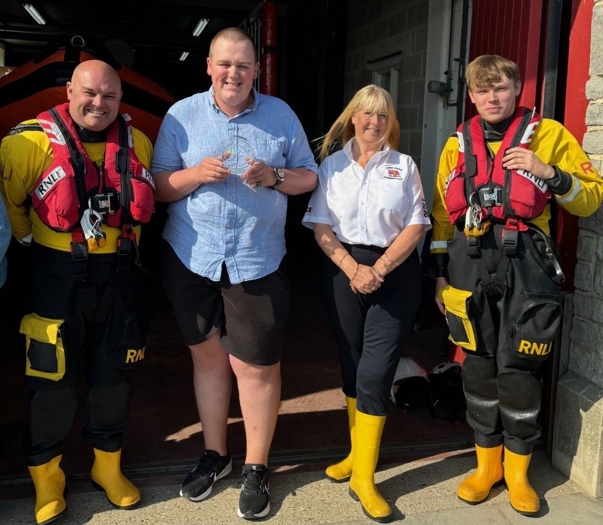 Award winner with lifeboat crew