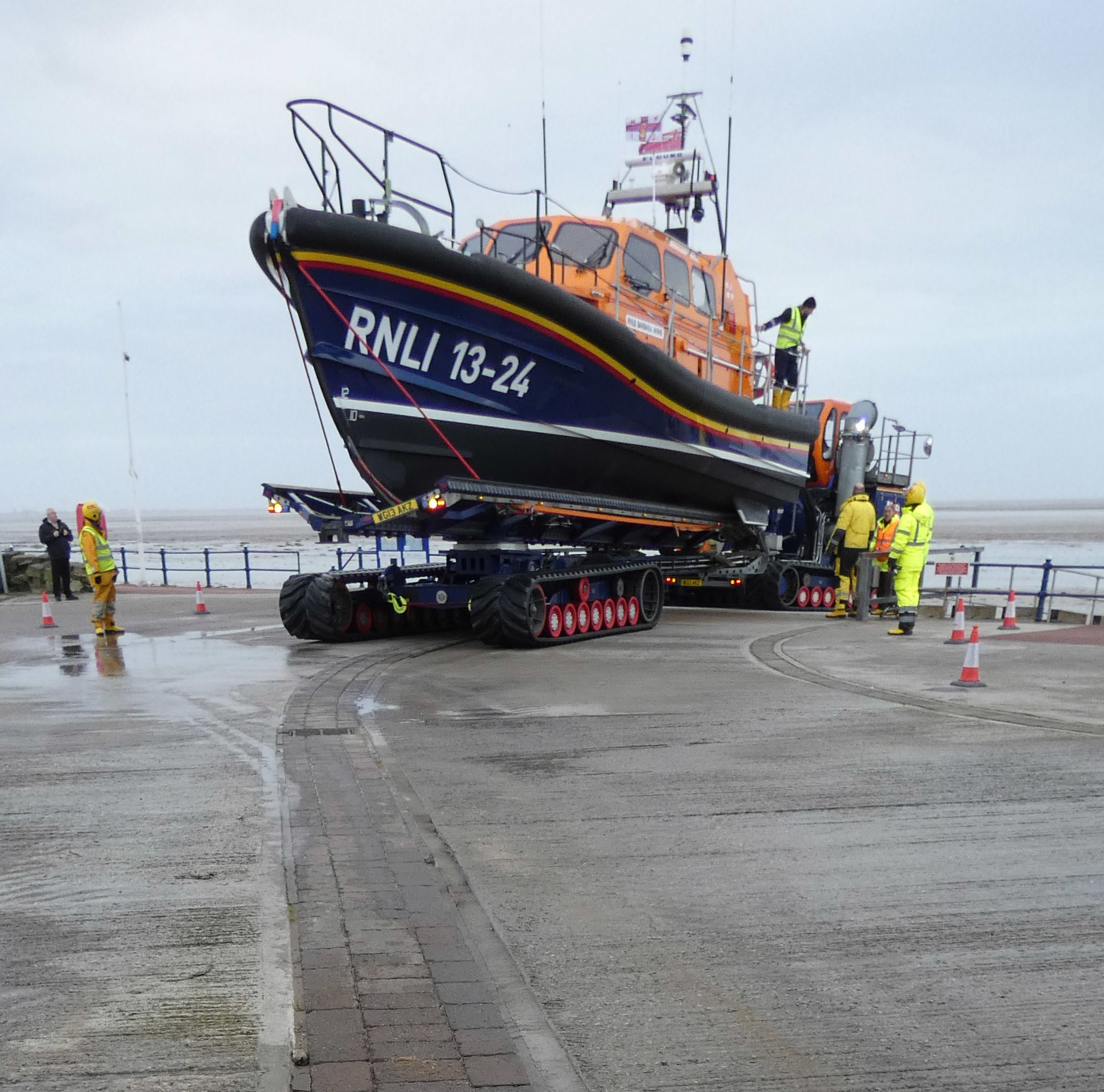 A Lifeboat sits on her carriageover a line of Pavers