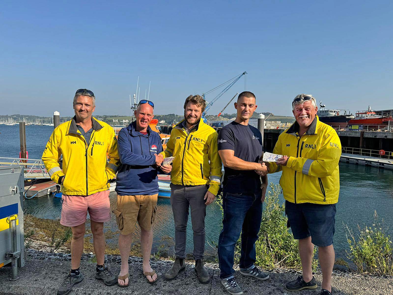 (Left to right) Afloat Mechanic Andrew Edwards, Andy Howell, Deputy Second Coxswain Elliot Holman, John Locker, and Coxswain Jonathon Blakeston
