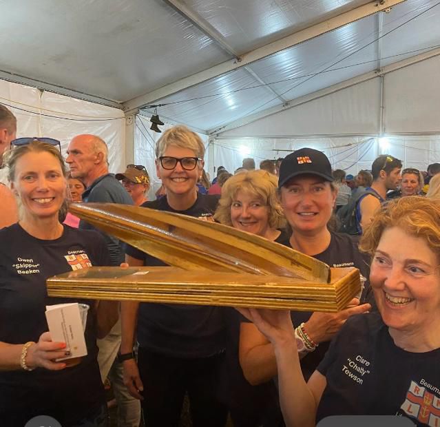 The team holding their Tamar Trophy