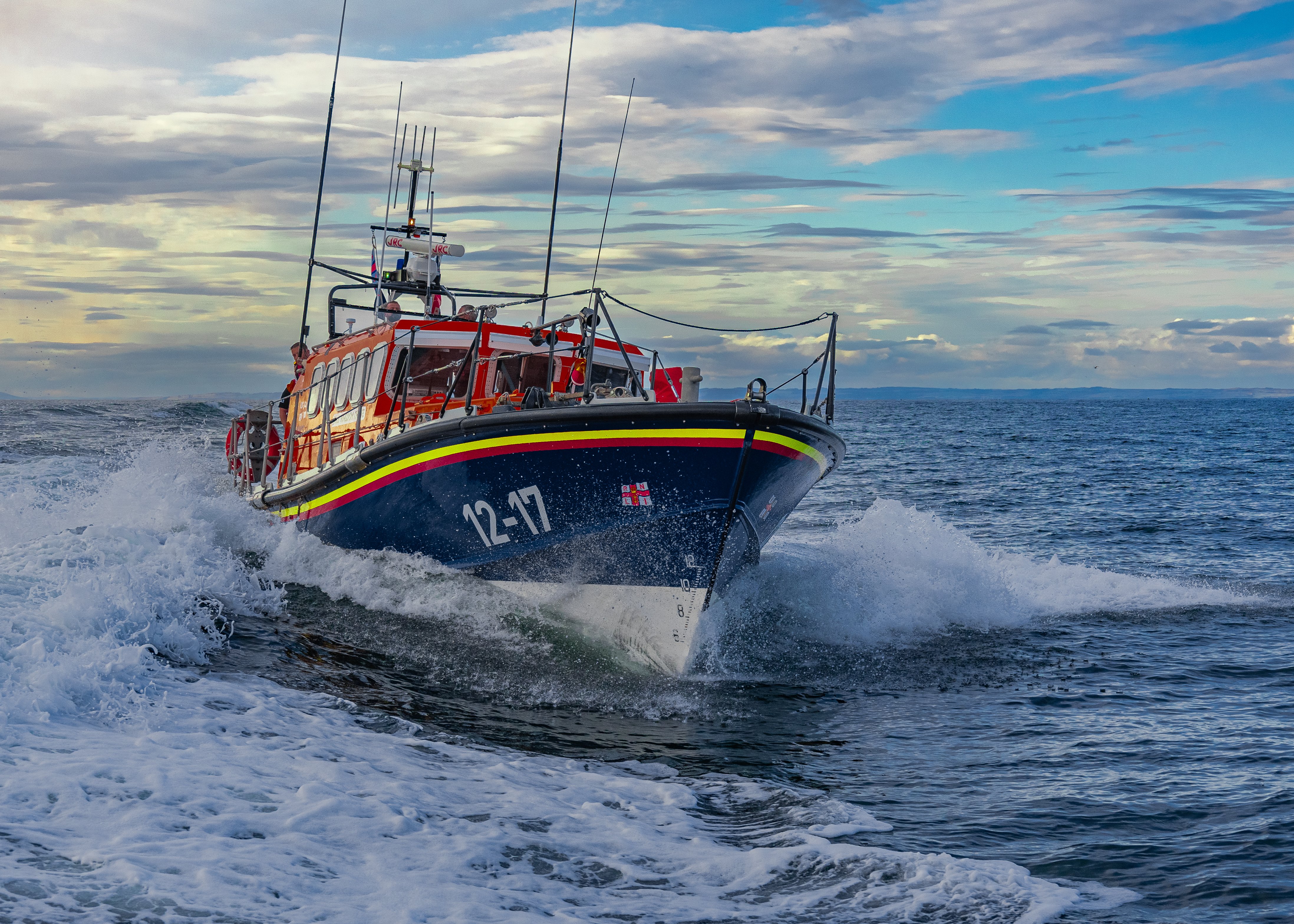 RNLI lifeboat on water.