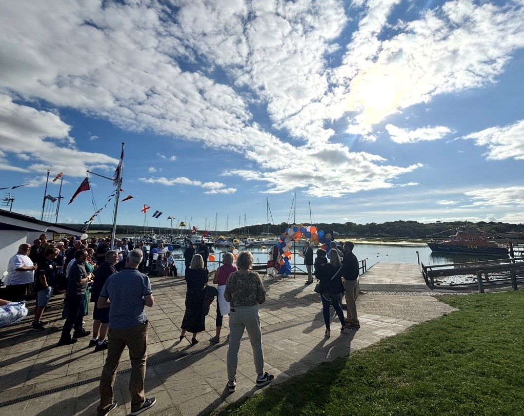 Guests listening to the speeches made by local historian Kevin Shaw, Lifeboat Operations Manager Tom Carlstedt-Duke, Coxswain Howard Lester and Lifeboat Station President Dame Ellen MacArthur.